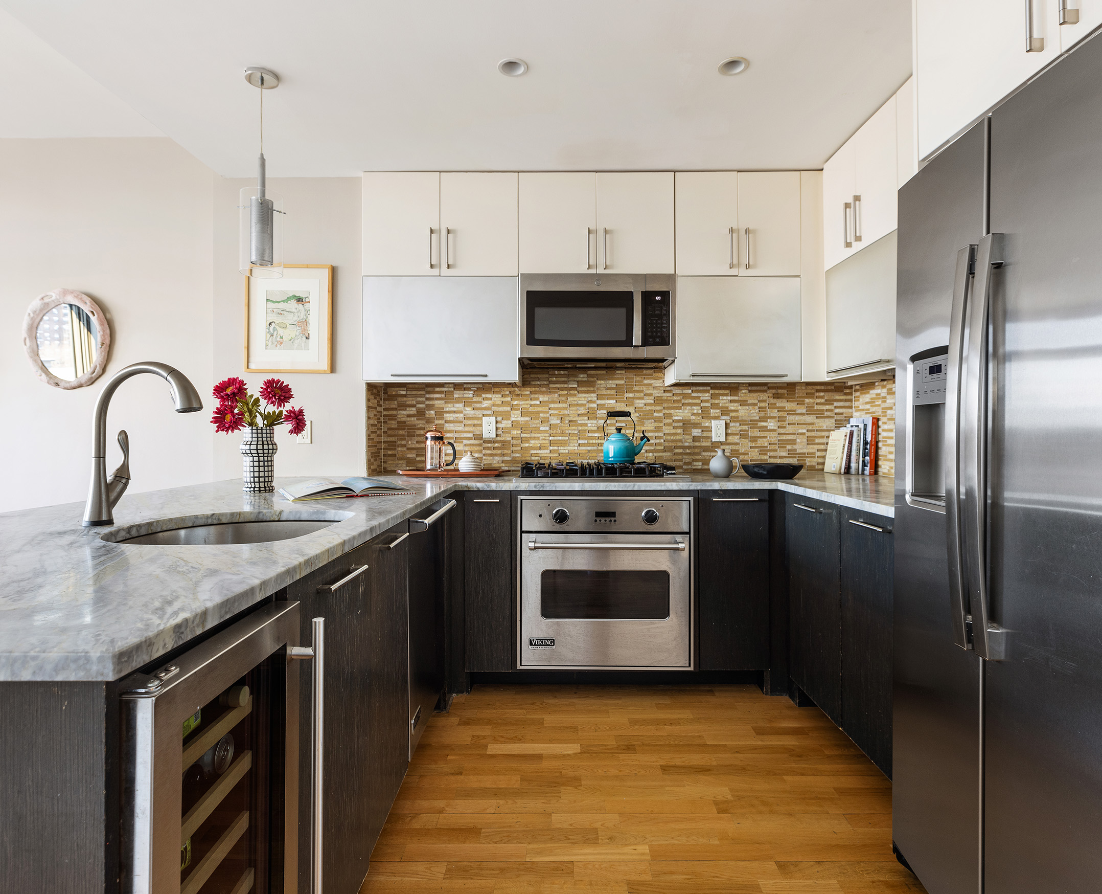 500 4th Avenue, Unit 7C Brooklyn, NY 11215 - Photo 3 of 12 a kitchen with stainless steel appliances granite countertop a sink stove and refrigerator