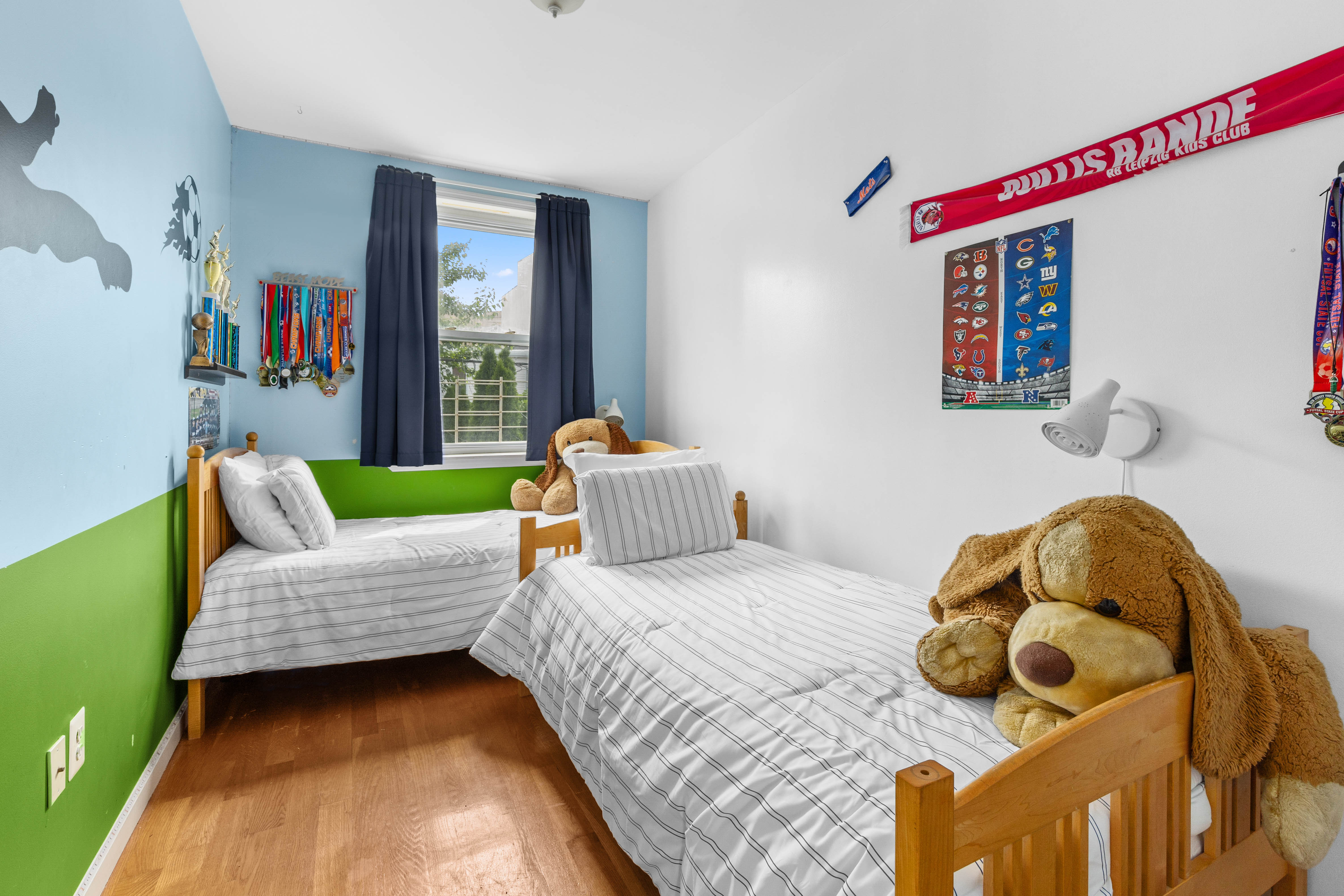 266 18th Street Brooklyn, NY 11215 - Photo 9 of 20 a bedroom with a bed and window