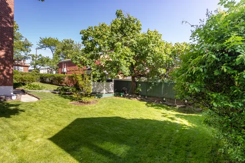 a view of yard with swimming pool