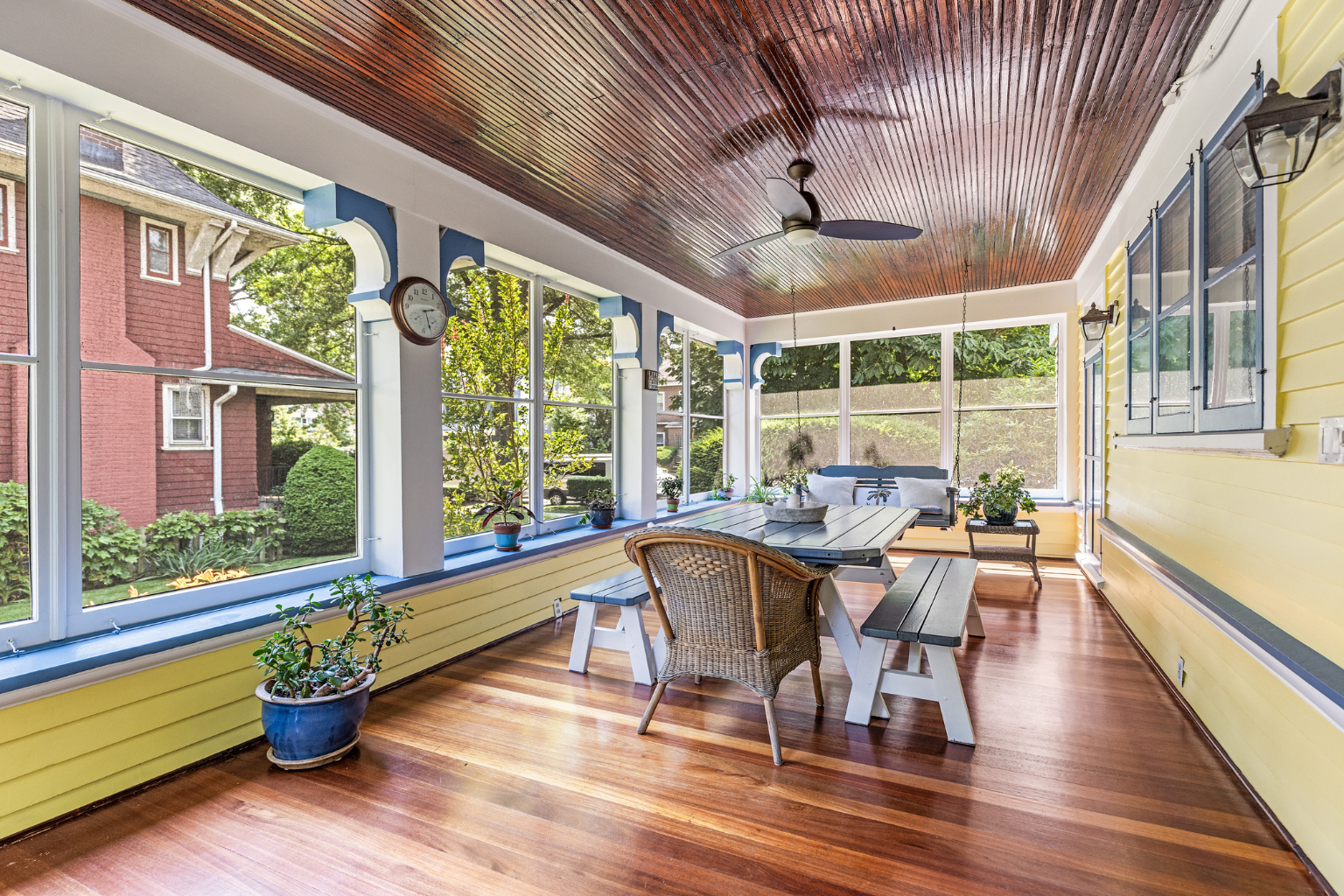 215 Marlborough Road Brooklyn, NY 11226 - Photo 7 of 21 a dining room with wooden floor a chandelier a glass table and chairs