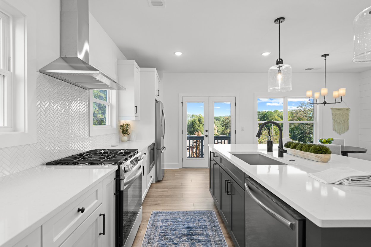 367 Kings Landing Atlanta, GA 30354 - Photo 6 of 45 a kitchen with stainless steel appliances a sink stove and cabinets