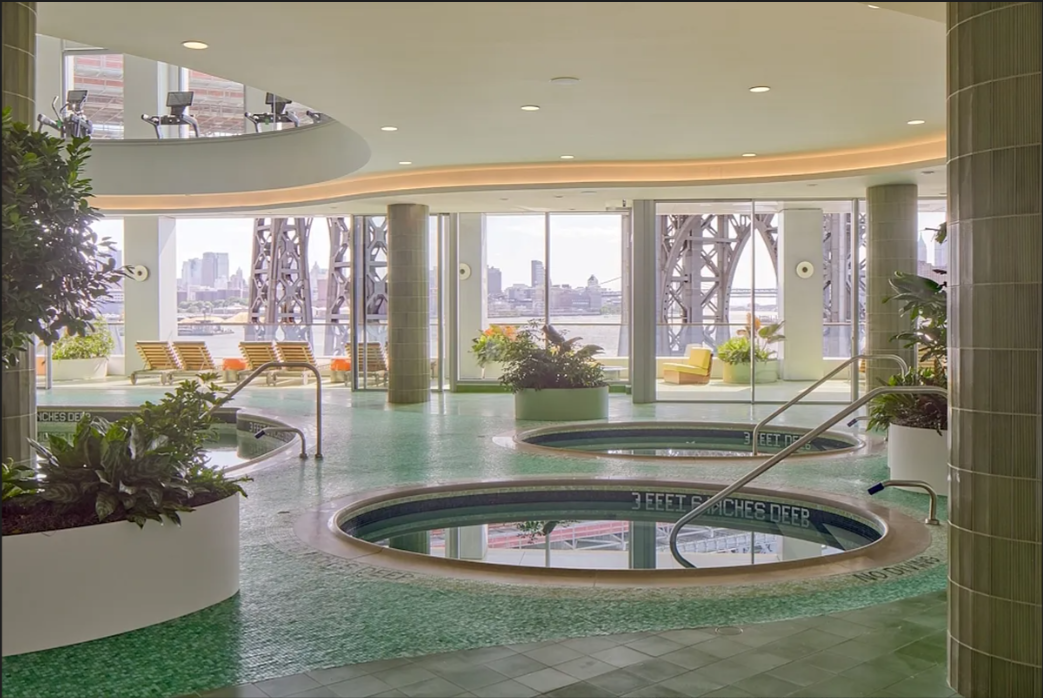 5 South 5th Street, Unit 5300 Brooklyn, NY 11249 - Photo 15 of 28 a view of a living room and kitchen floor to ceiling window and kitchen