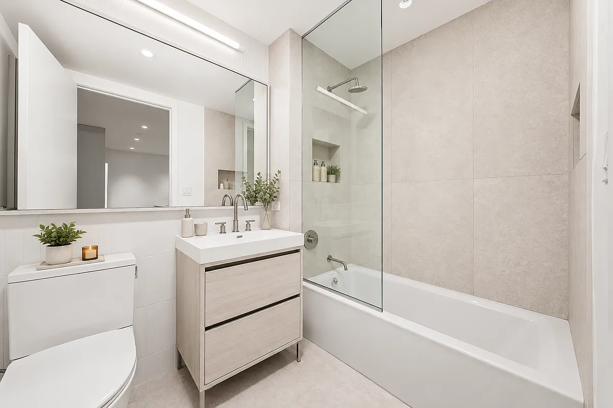 130 2nd Street, Unit 2B Brooklyn, NY 11231 - Photo 9 of 22 a bathroom with a sink a toilet and shower