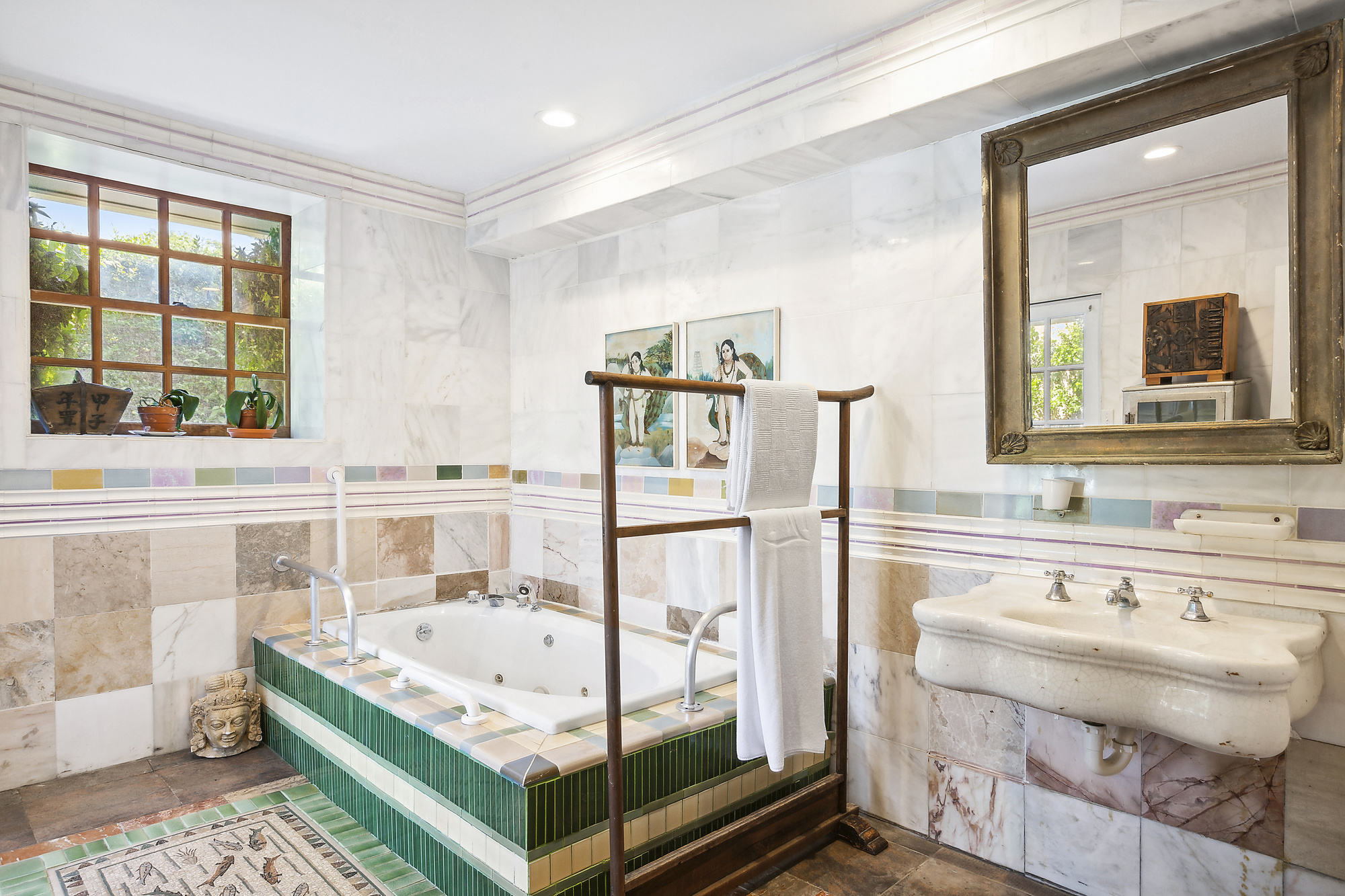 488 Ocean Road Bridgehampton, NY 11932 - Photo 14 of 21 a bathroom with a tub sink and mirror