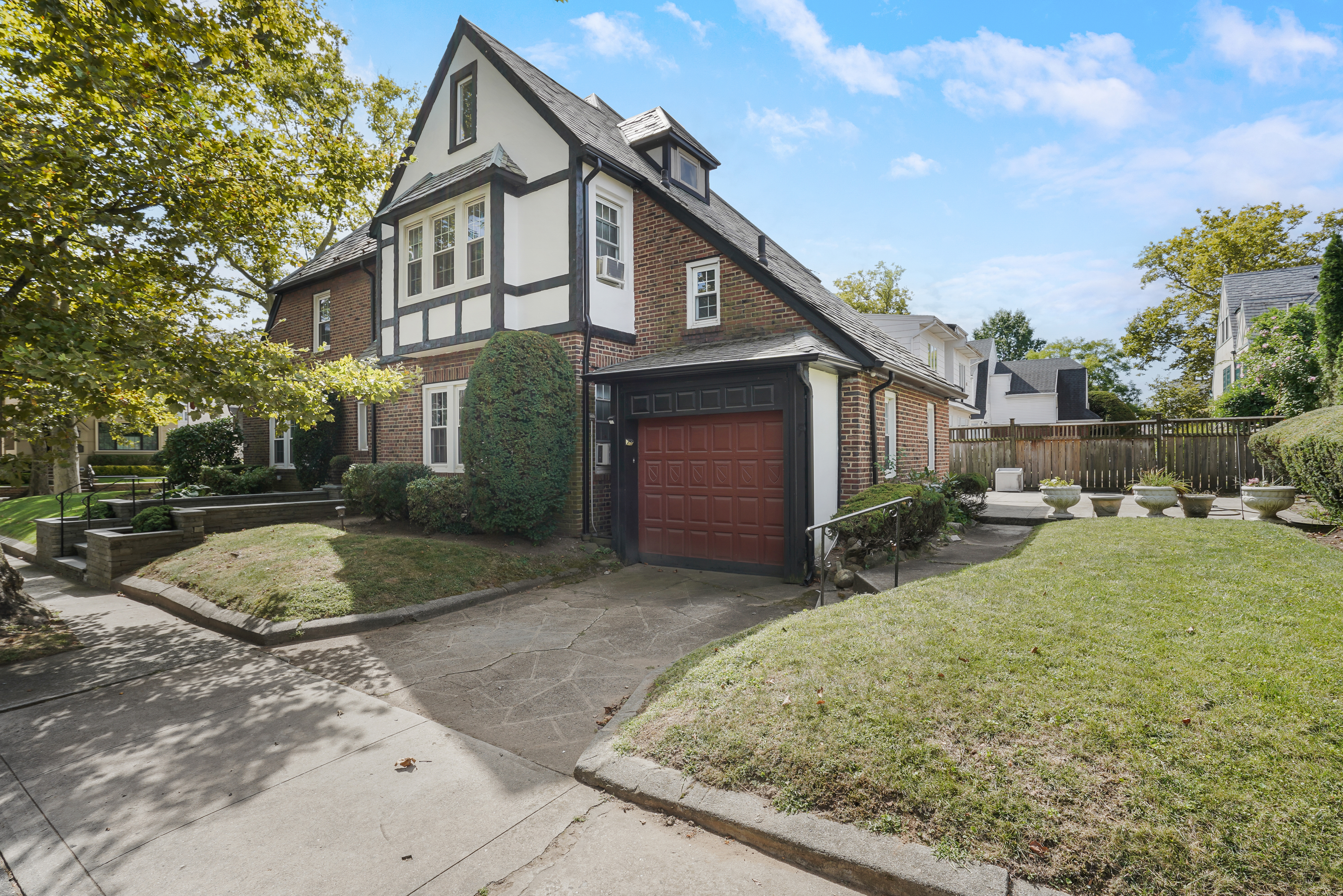 8028 Harbor View Terrace Brooklyn, NY 11209 - Photo 14 of 16 a view of a house with a yard