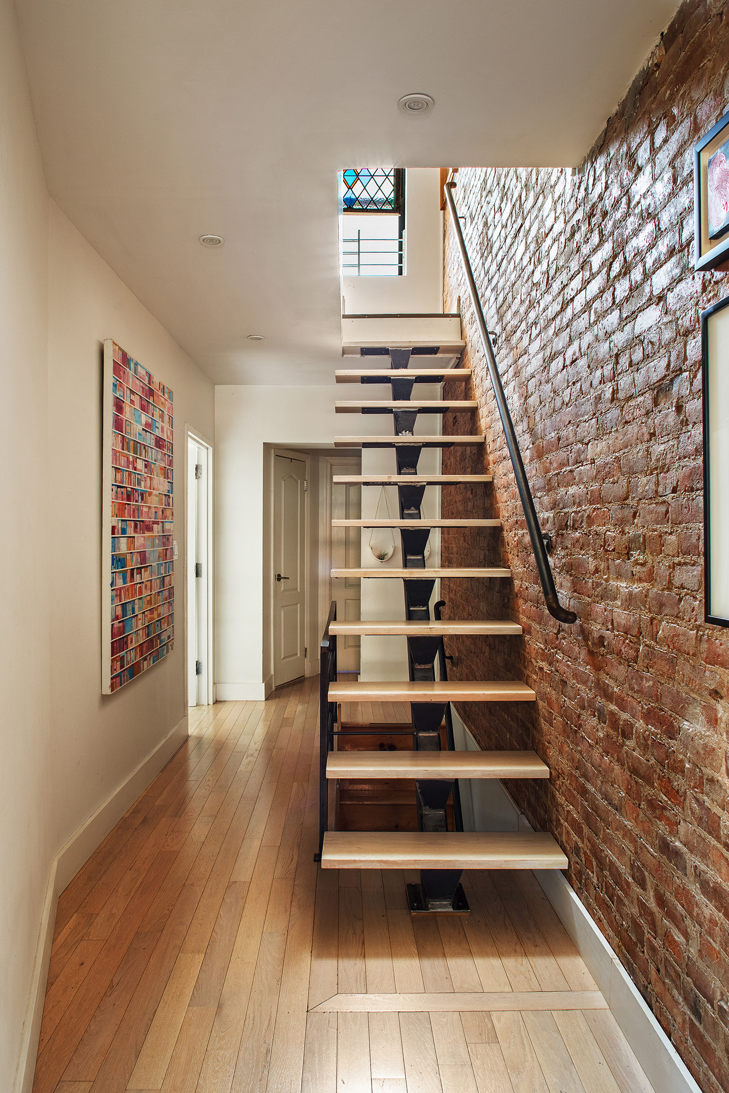114 Pioneer Street Brooklyn, NY 11231 - Photo 5 of 17 a view of entryway with wooden floor
