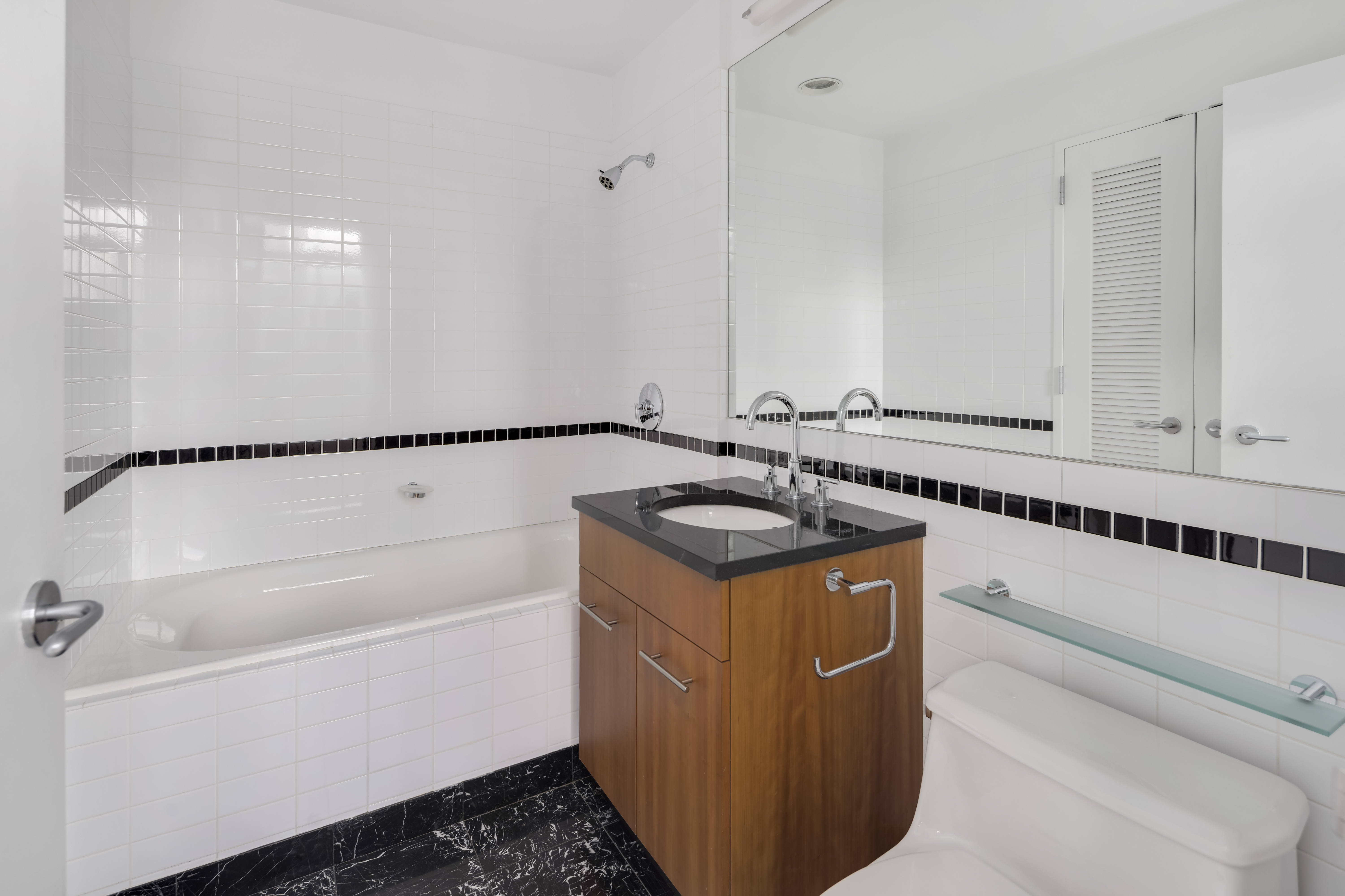 11 East 29th Street, Unit 15B Manhattan, NY 10016 - Photo 6 of 8 a utility room with sink dryer and washer