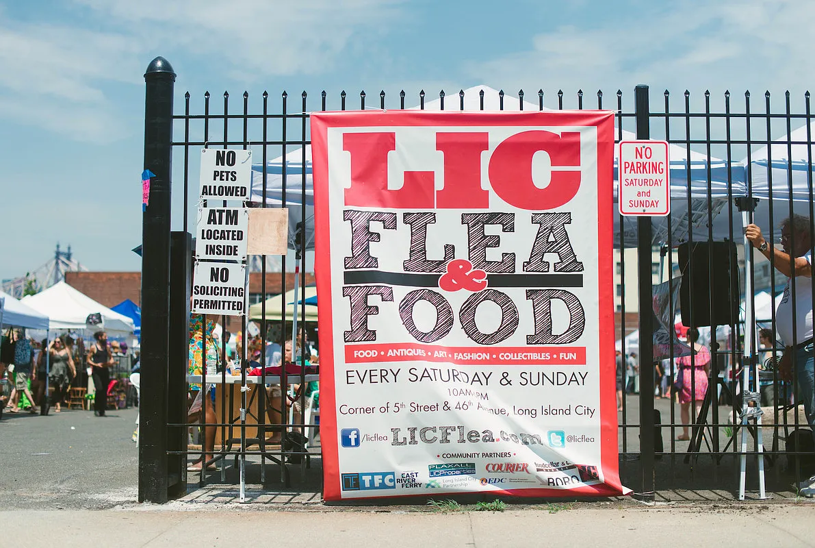 26-14 Jackson Avenue, Unit PHD Queens, NY 11101 - Photo 7 of 11 a sign on the side of a street