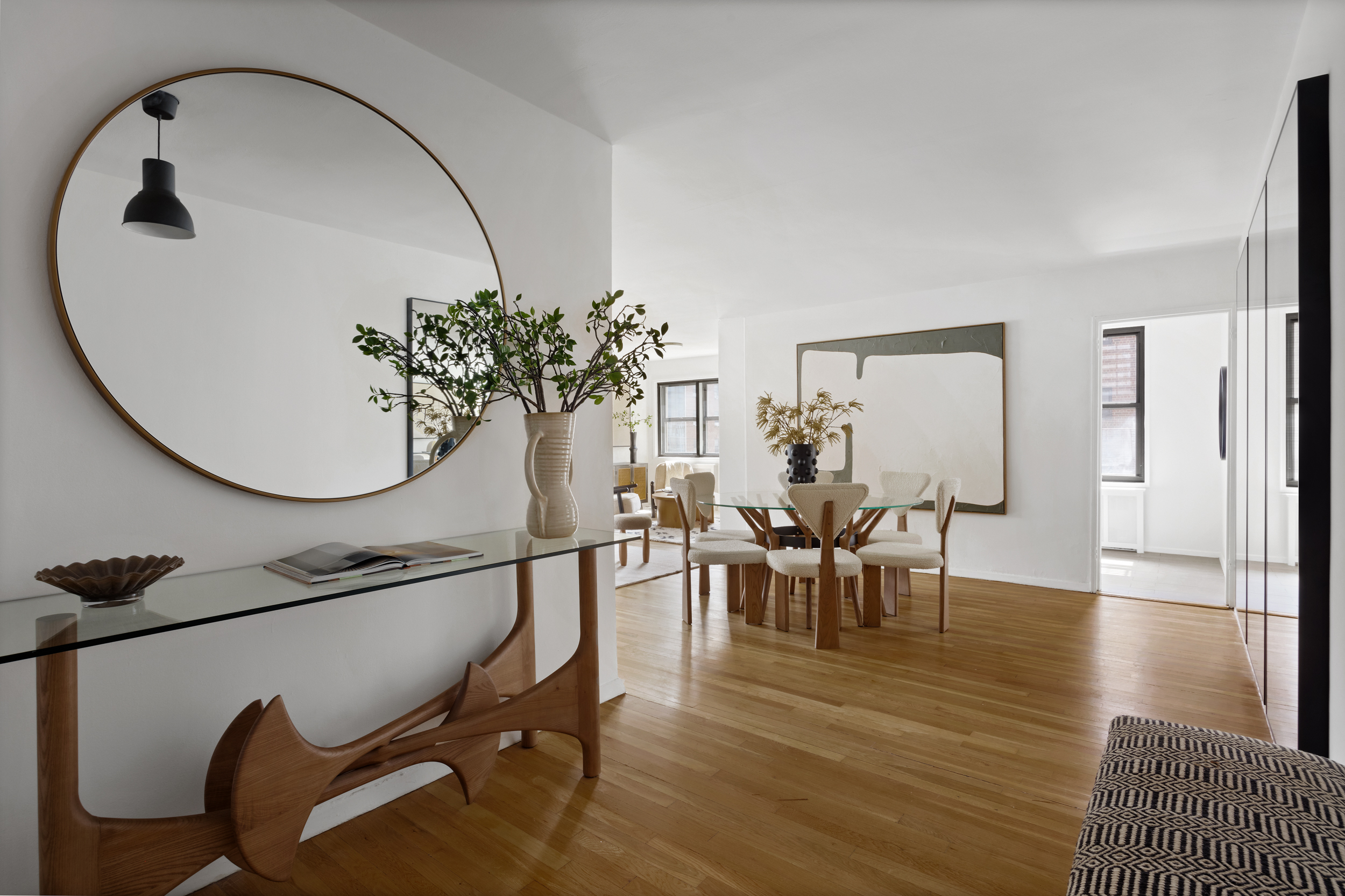140 7th Avenue, Unit 4L Manhattan, NY 10011 - Photo 6 of 14 a view of a dining room with furniture and wooden floor