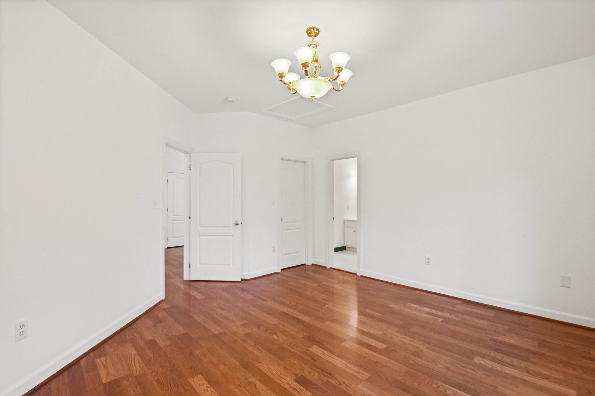 2628 Five Oaks Road Vienna, VA 22181 - Photo 28 of 40 a view of an empty room with wooden floor