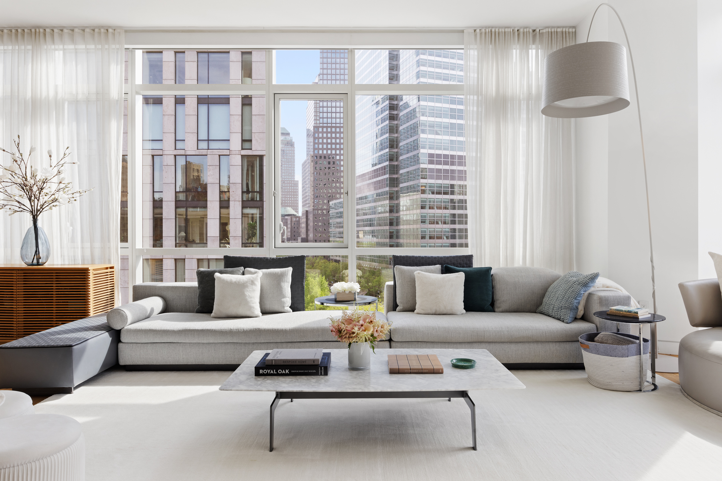 200 Chambers Street, Unit 7AI Manhattan, NY 10007 - Photo 2 of 28 a living room with furniture and a large window