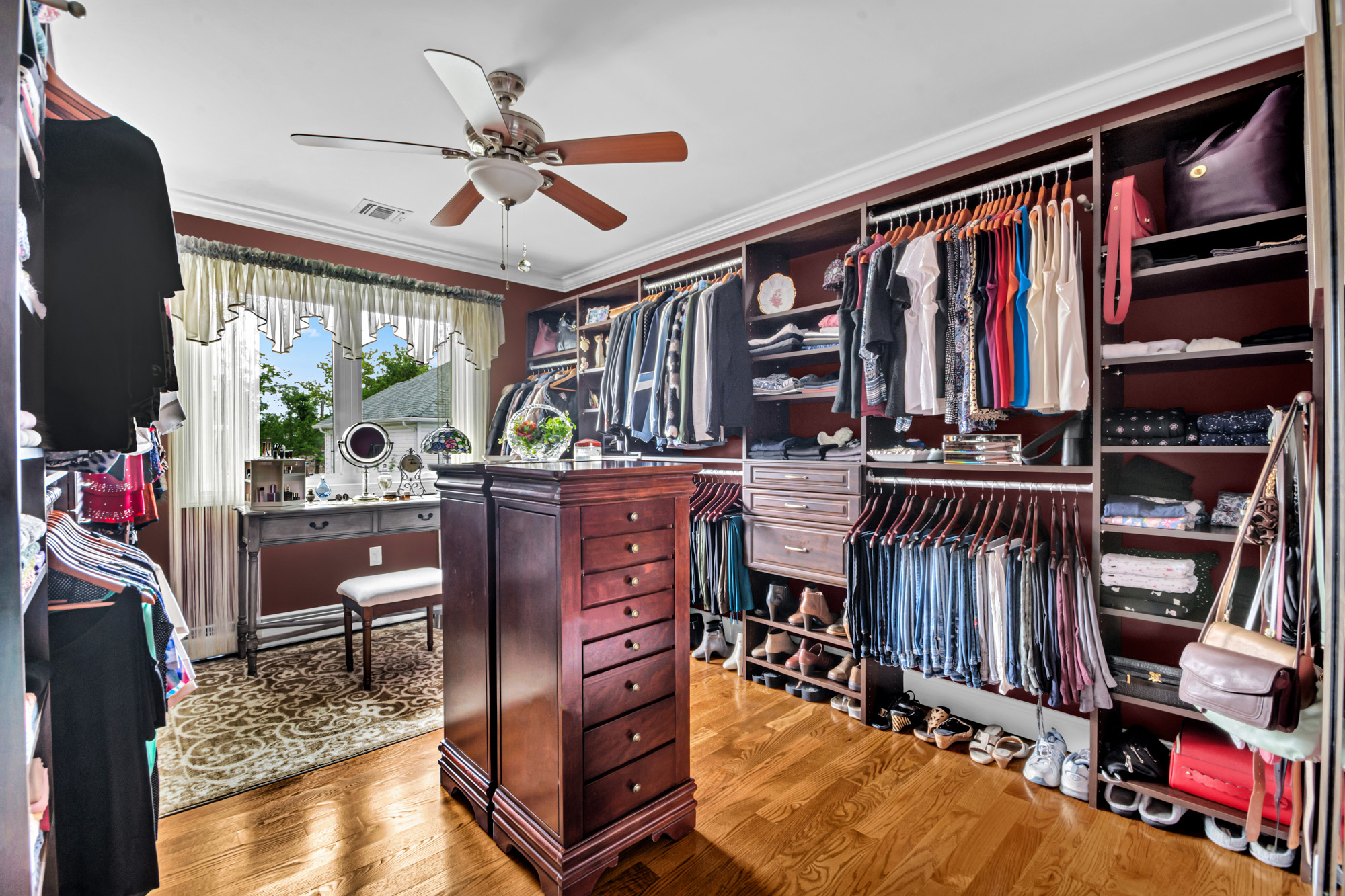 909 Jewett Avenue Staten Island, NY 10314 - Photo 20 of 65 a view of a workspace with furniture and a floor to ceiling window