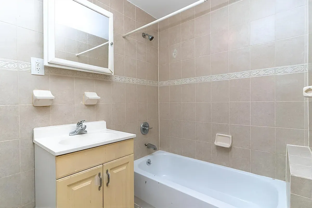 a bathroom with a sink and a bathtub