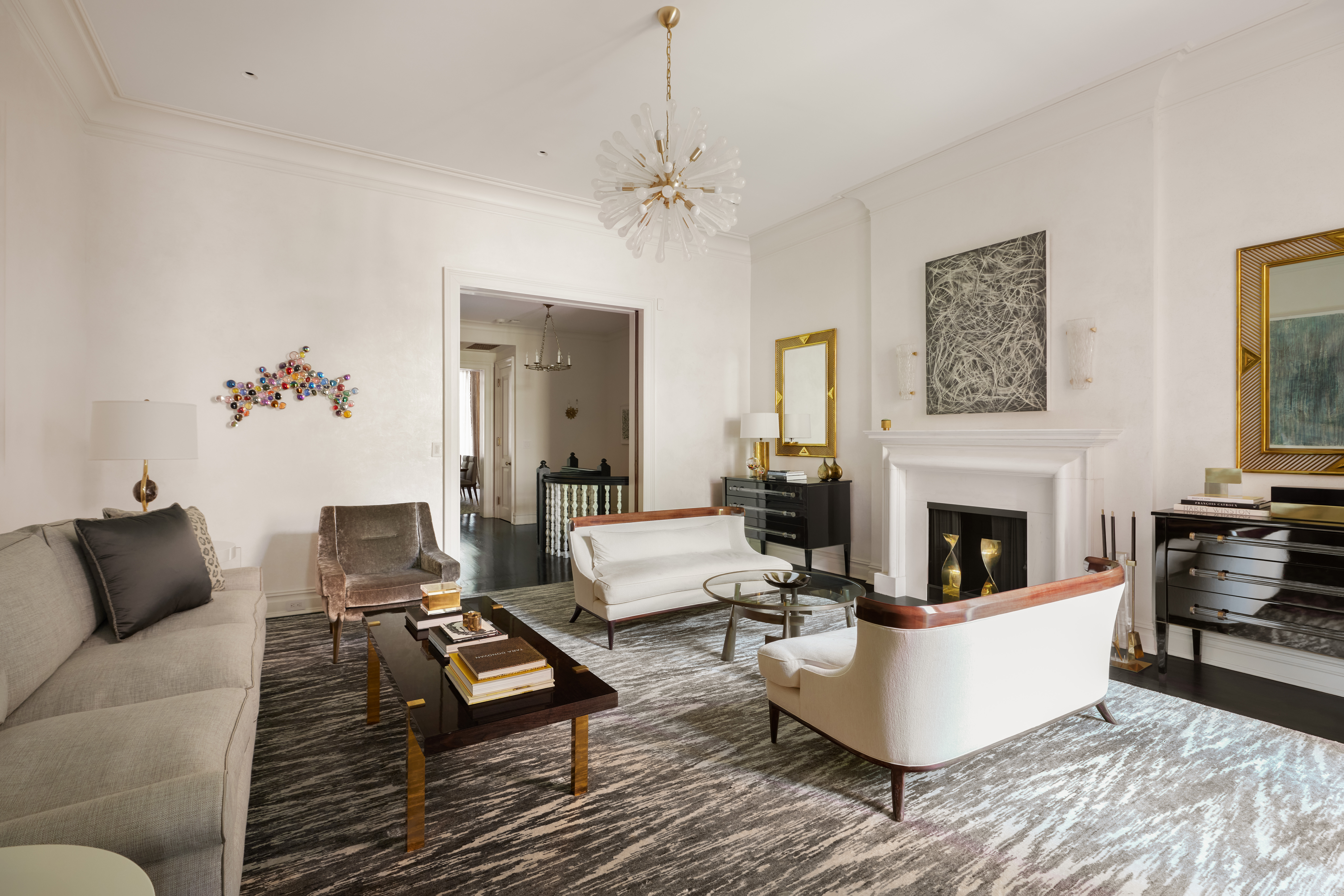 135 West 77th Street Manhattan, NY 10024 - Photo 8 of 32 a living room with furniture and a fireplace