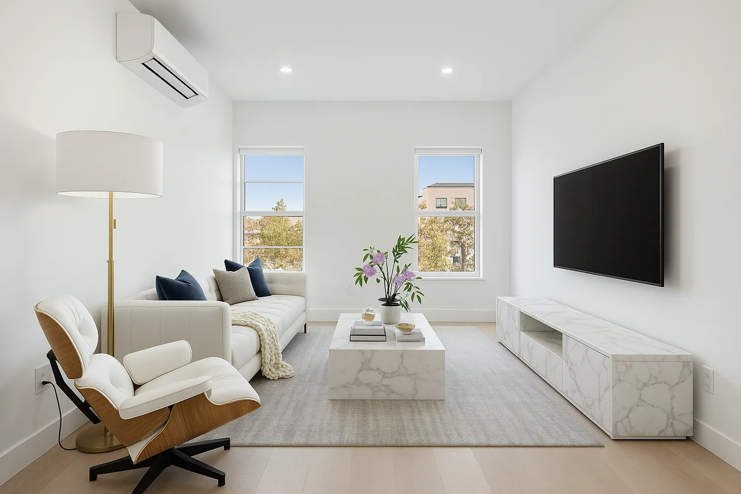a living room with furniture and a flat screen tv