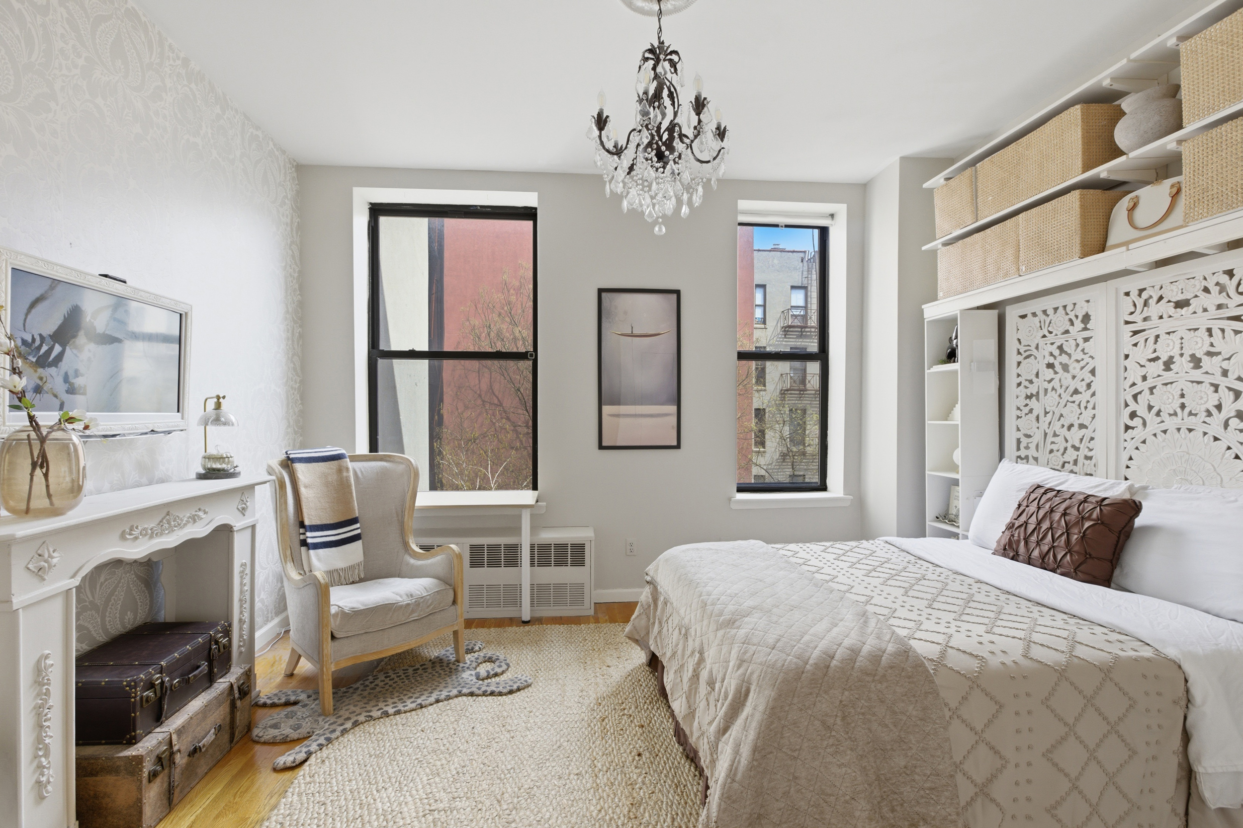 127 West 123rd Street Manhattan, NY 10027 - Photo 13 of 28 a bedroom with a bed wooden floor and window