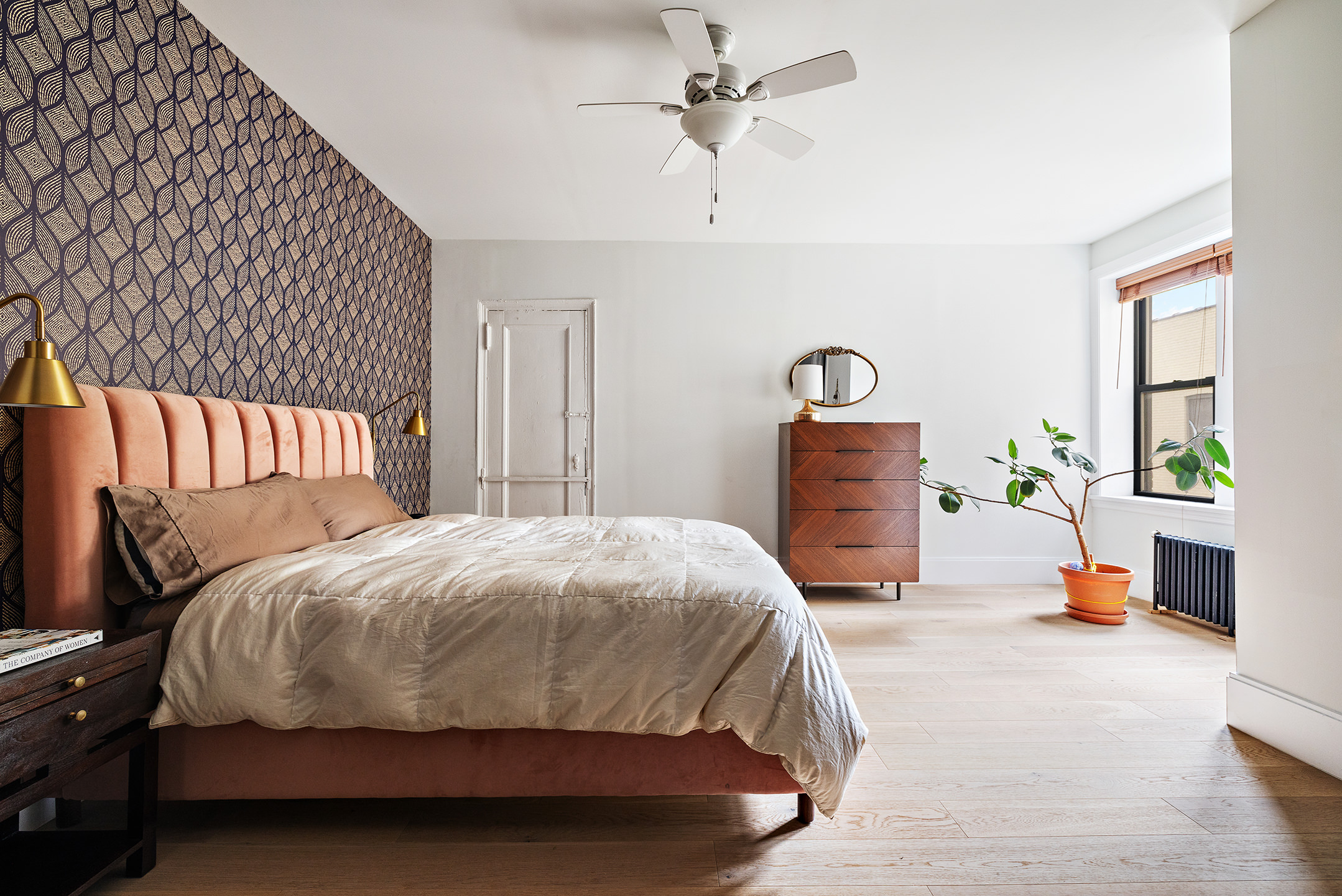163 Ocean Avenue, Unit G6 Brooklyn, NY 11225 - Photo 5 of 12 a bedroom with a bed and a chandelier
