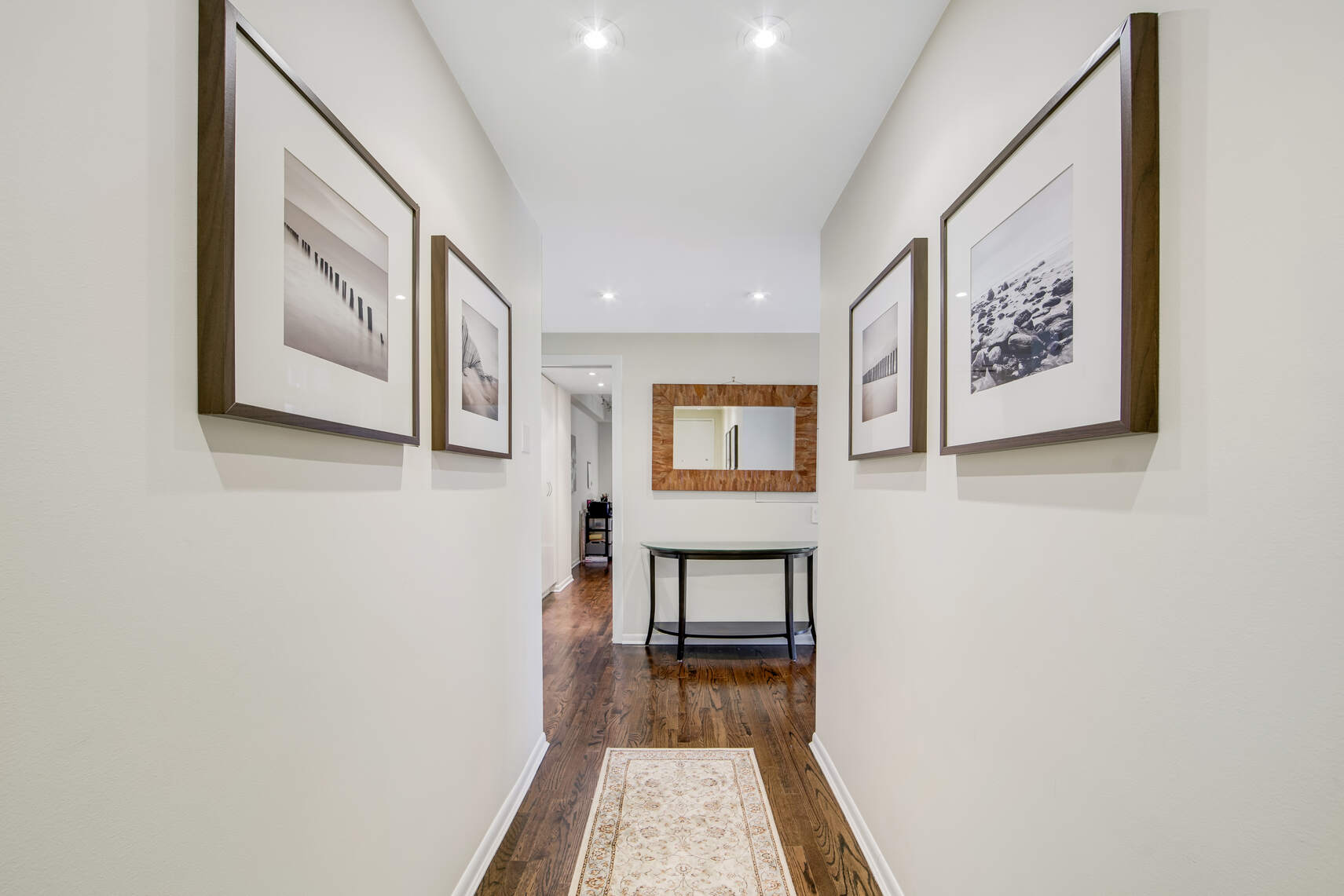150 West 56th Street, Unit 3812 Manhattan, NY 10019 - Photo 7 of 14 a view of hallway with window and furniture