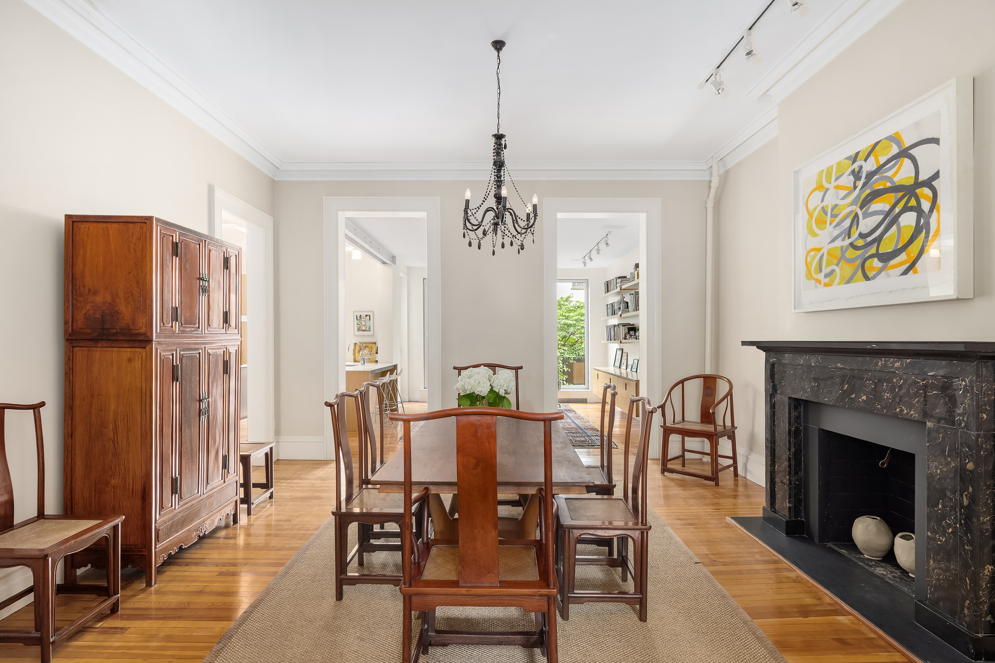 128 State Street, Unit 2 Brooklyn, NY 11201 - Photo 3 of 15 a dining room with furniture a chandelier and wooden floor