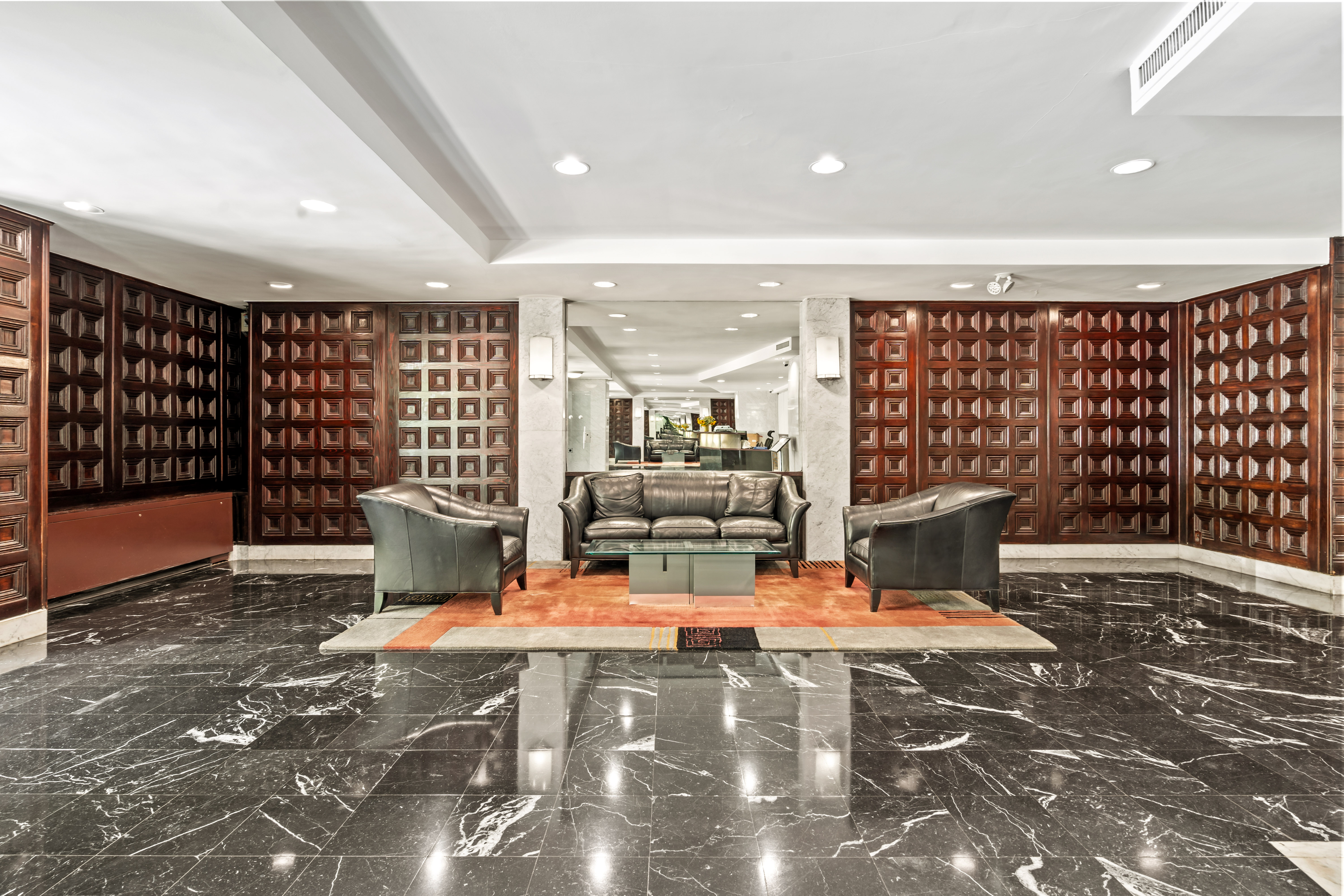 205 3rd Avenue, Unit 11T Manhattan, NY 10003 - Photo 16 of 20 a living room with furniture