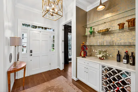 a kitchen with stainless steel appliances a stove a sink and a refrigerator