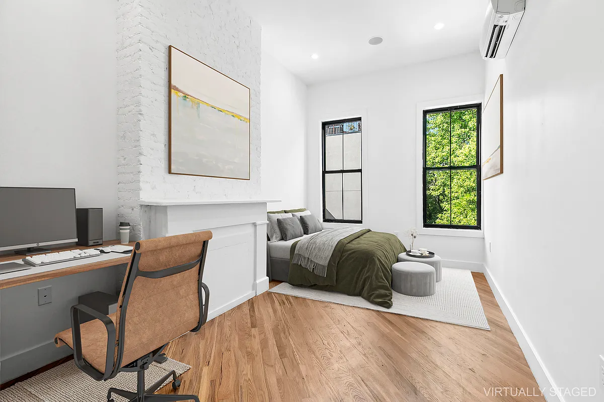 866 Bushwick Avenue, Unit 3 Brooklyn, NY 11221 - Photo 4 of 12 a bedroom with a bed and a window