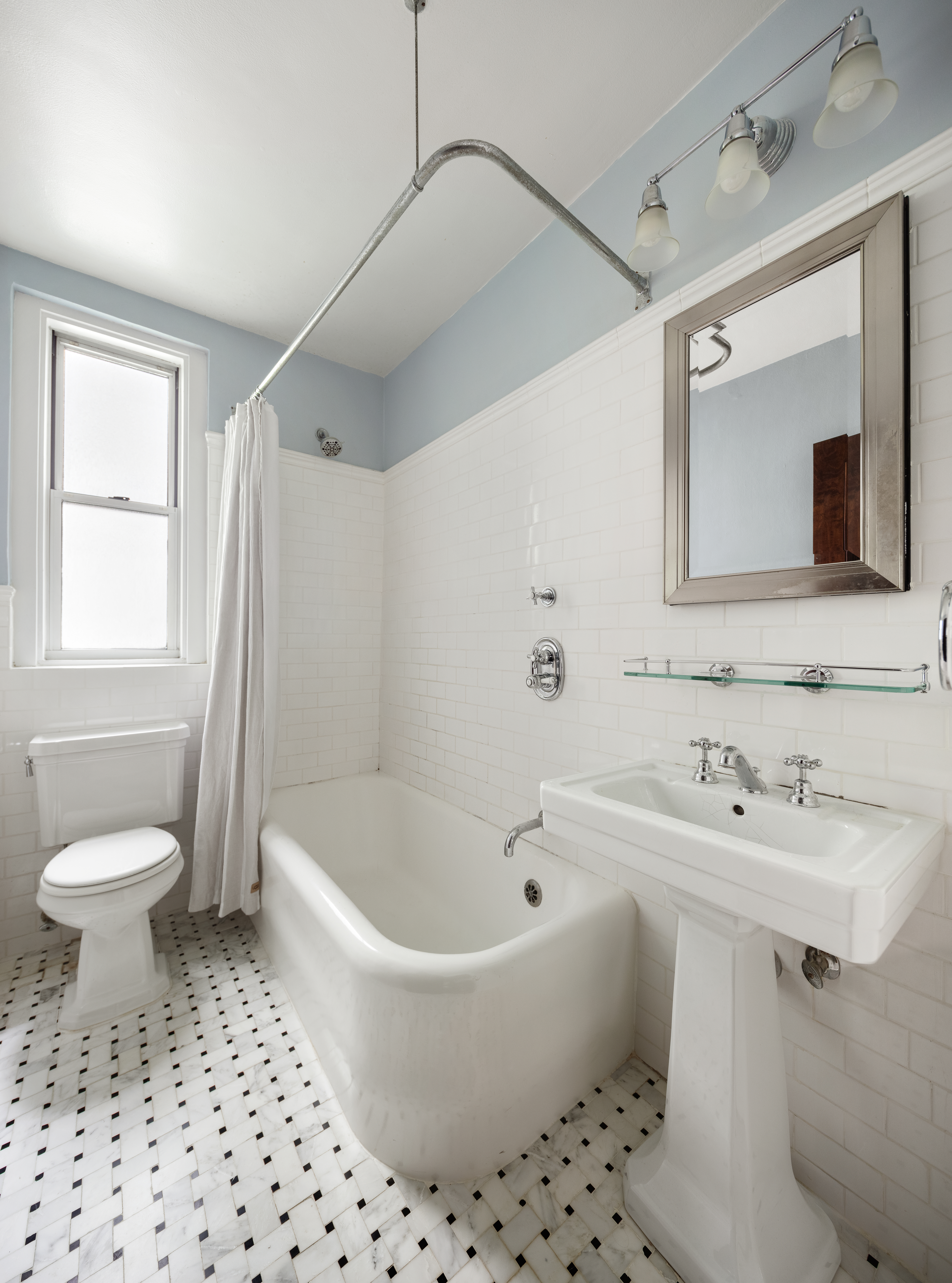 173-175 Riverside Drive, Unit 2L Manhattan, NY 10024 - Photo 9 of 18 a bathroom with a sink toilet and shower