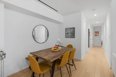 a view of a dining room with furniture