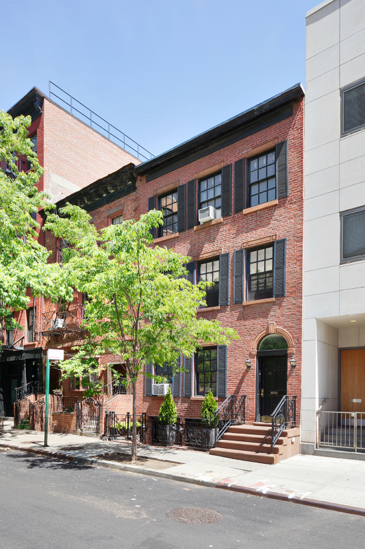 57 Sullivan Street, Unit DUPLEX Manhattan, NY 10012 - Photo 8 of 9 a view of a building with a street