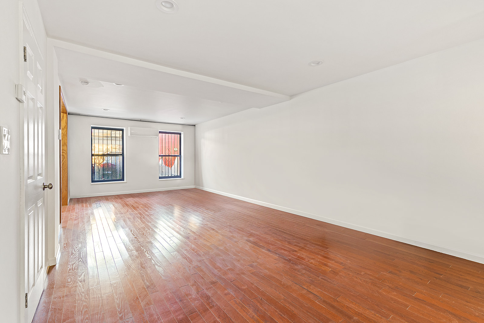 1644 Atlantic Avenue Brooklyn, NY 11213 - Photo 14 of 17 a view of a room with wooden floor and window