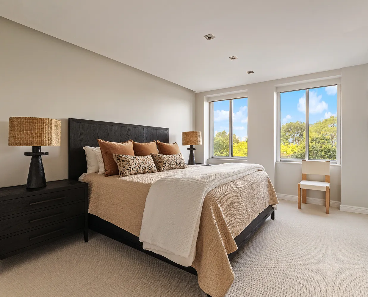 a bedroom with a bed and a couch