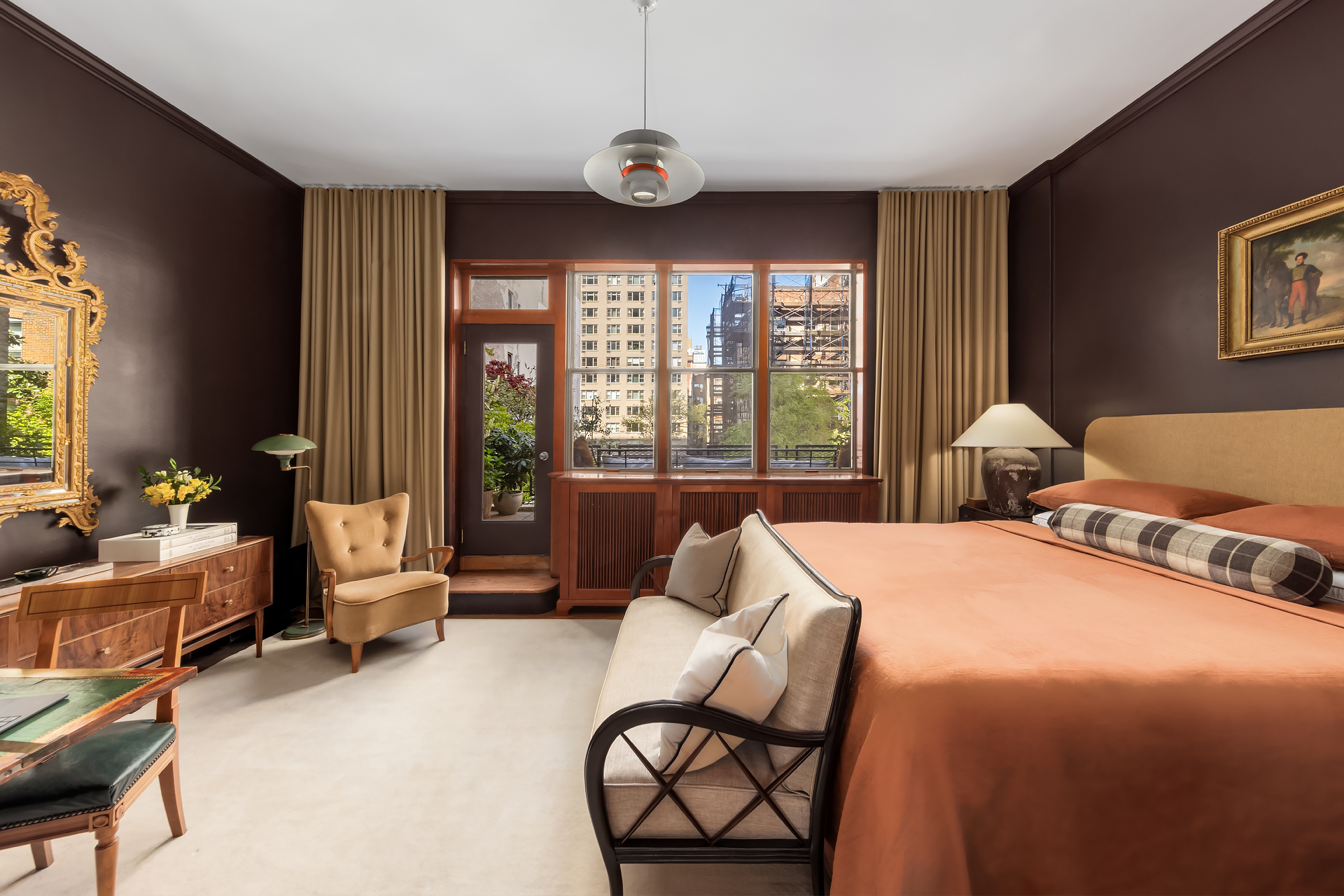 159 West 13th Street Manhattan, NY 10011 - Photo 25 of 36 a bedroom with a bed and large windows