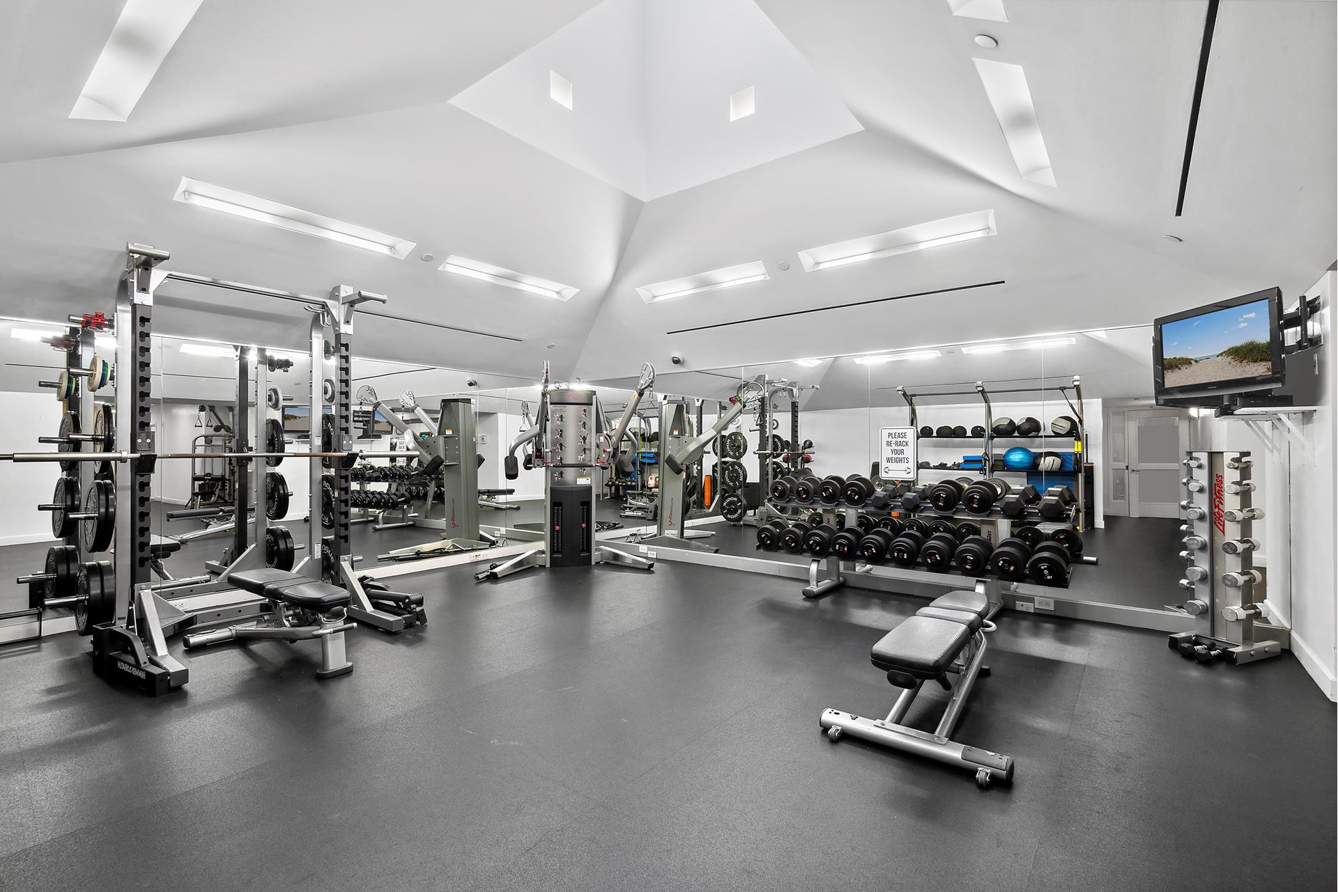 311 West Broadway, Unit 5G Manhattan, NY 10013 - Photo 11 of 14 a view of a room with gym equipment