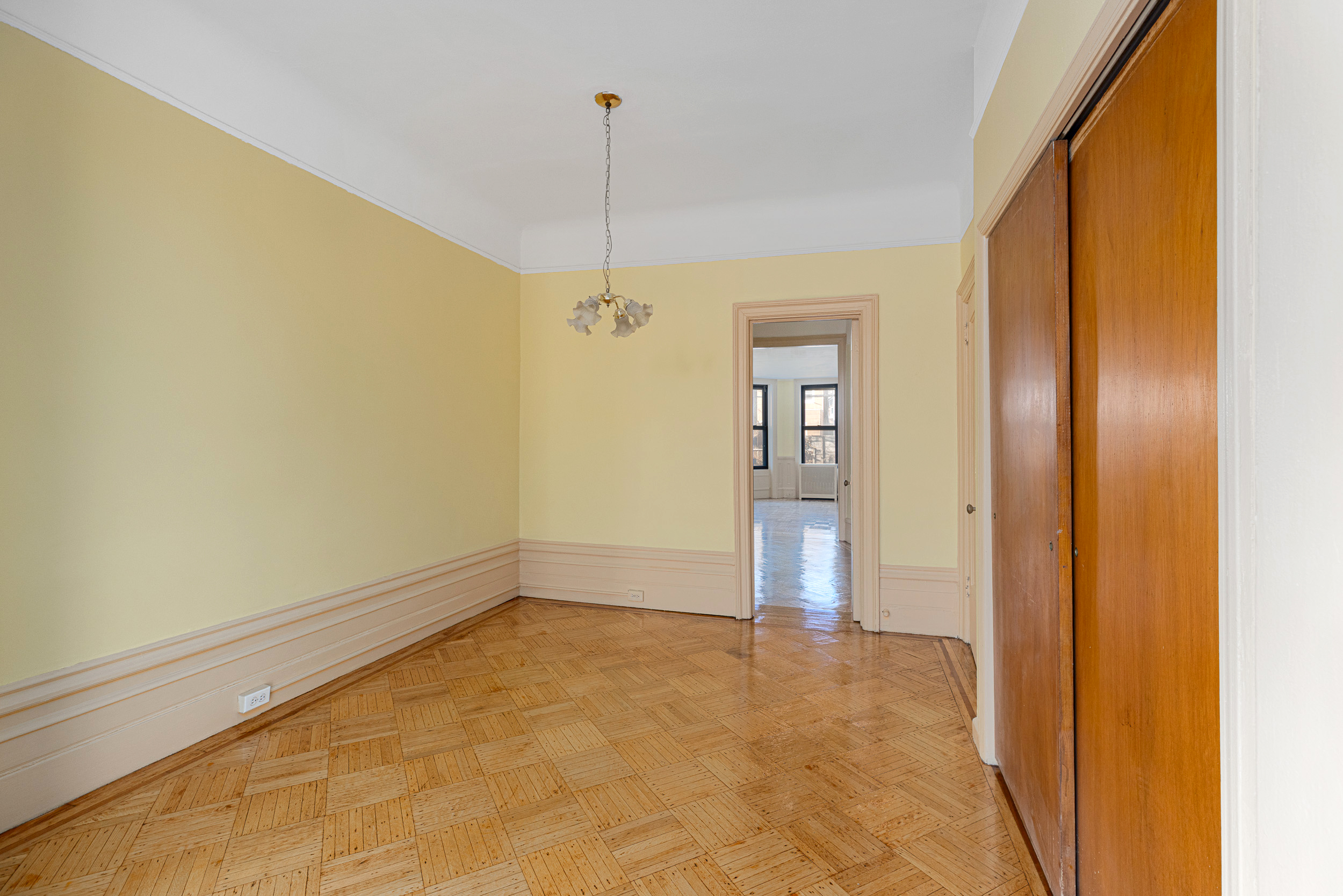 304 East 8th Street Brooklyn, NY 11218 - Photo 22 of 32 a view of an empty room and window