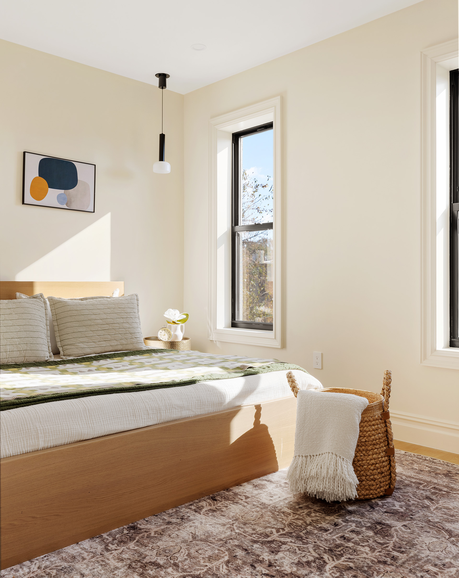 198 Madison Street, Unit SF Brooklyn, NY 11216 - Photo 12 of 19 a room with a couch and a potted plant