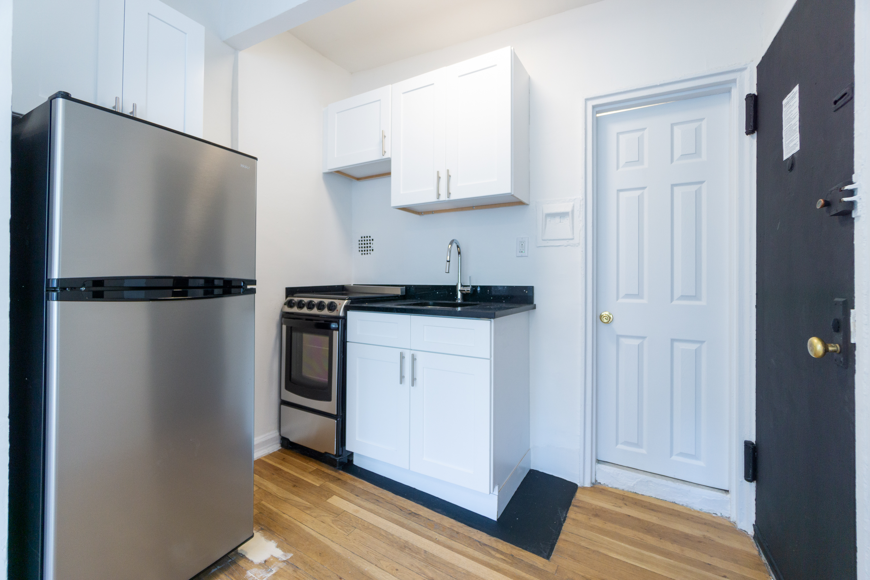 319 East 5th Street, Unit 9 Manhattan, NY 10003 - Photo 5 of 12 a view of a storage & utility room with closet dryer
