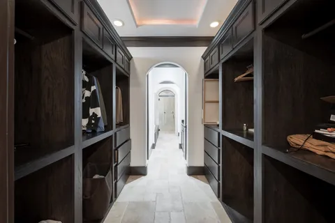 a media room with lots of chairs and a projector screen