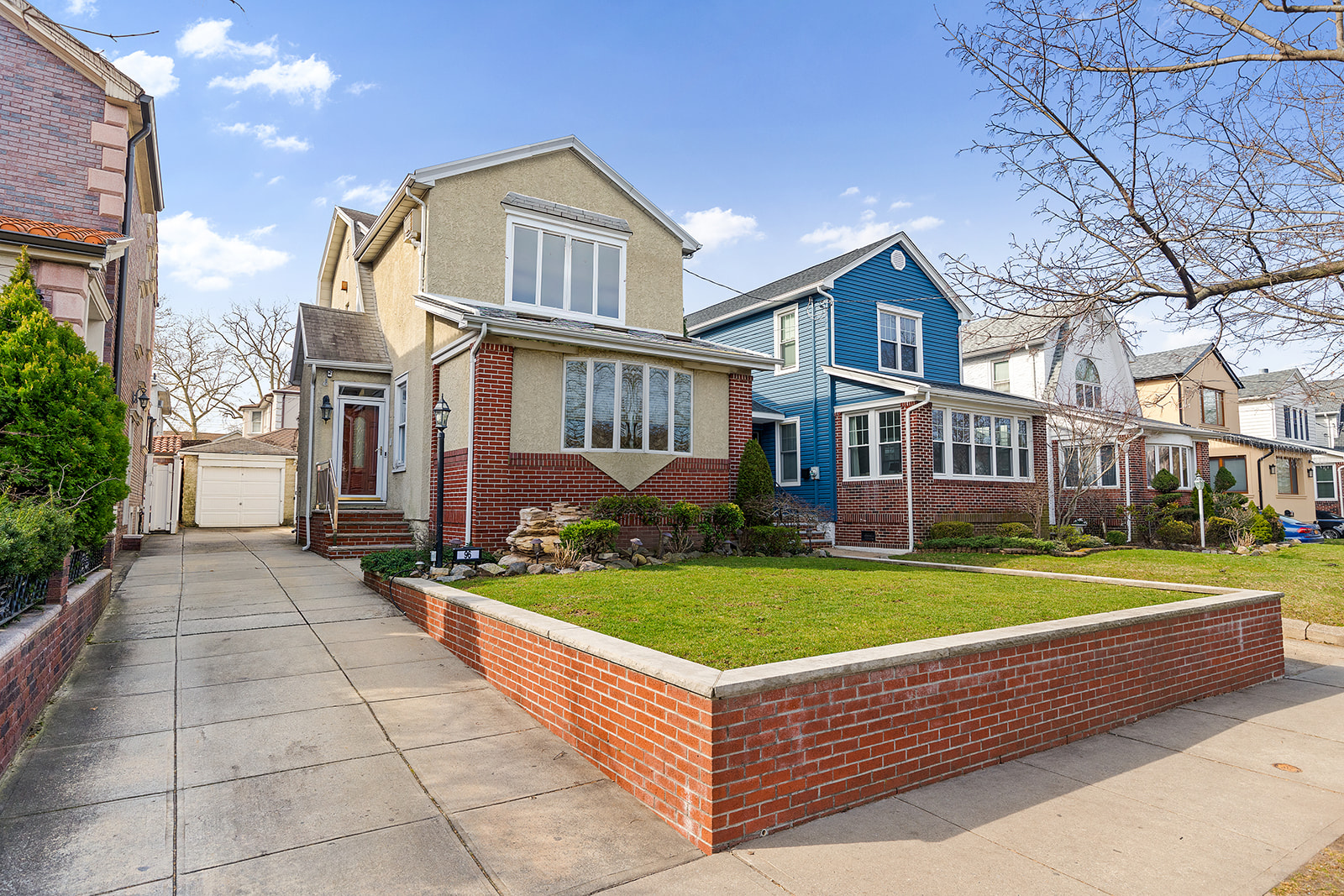 96 86th Street Brooklyn, NY 11209 - Photo 12 of 13 a front view of a house with garden