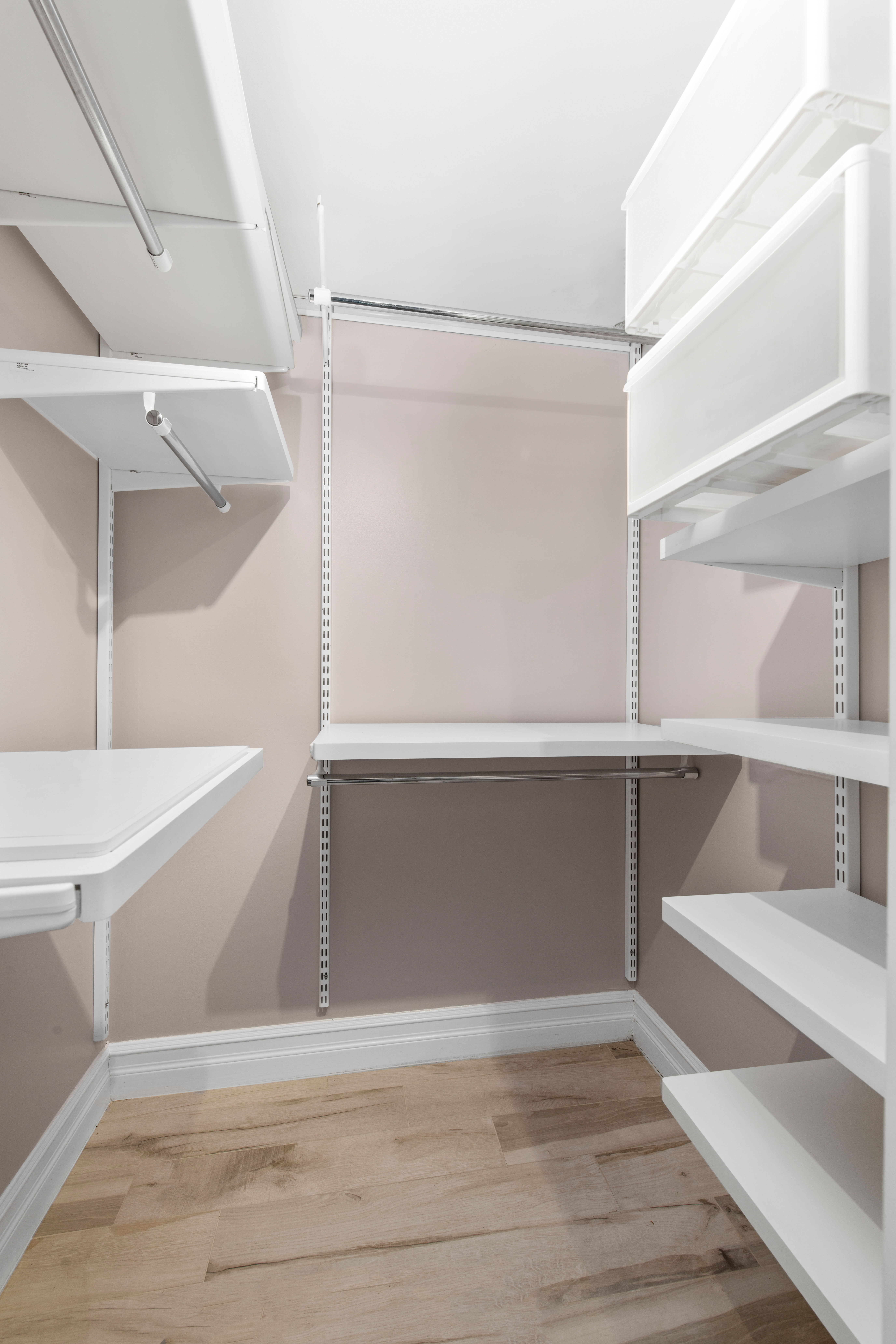 135 Ridge Street, Unit 5A Manhattan, NY 10002 - Photo 9 of 11 a view of walk in closet with empty racks