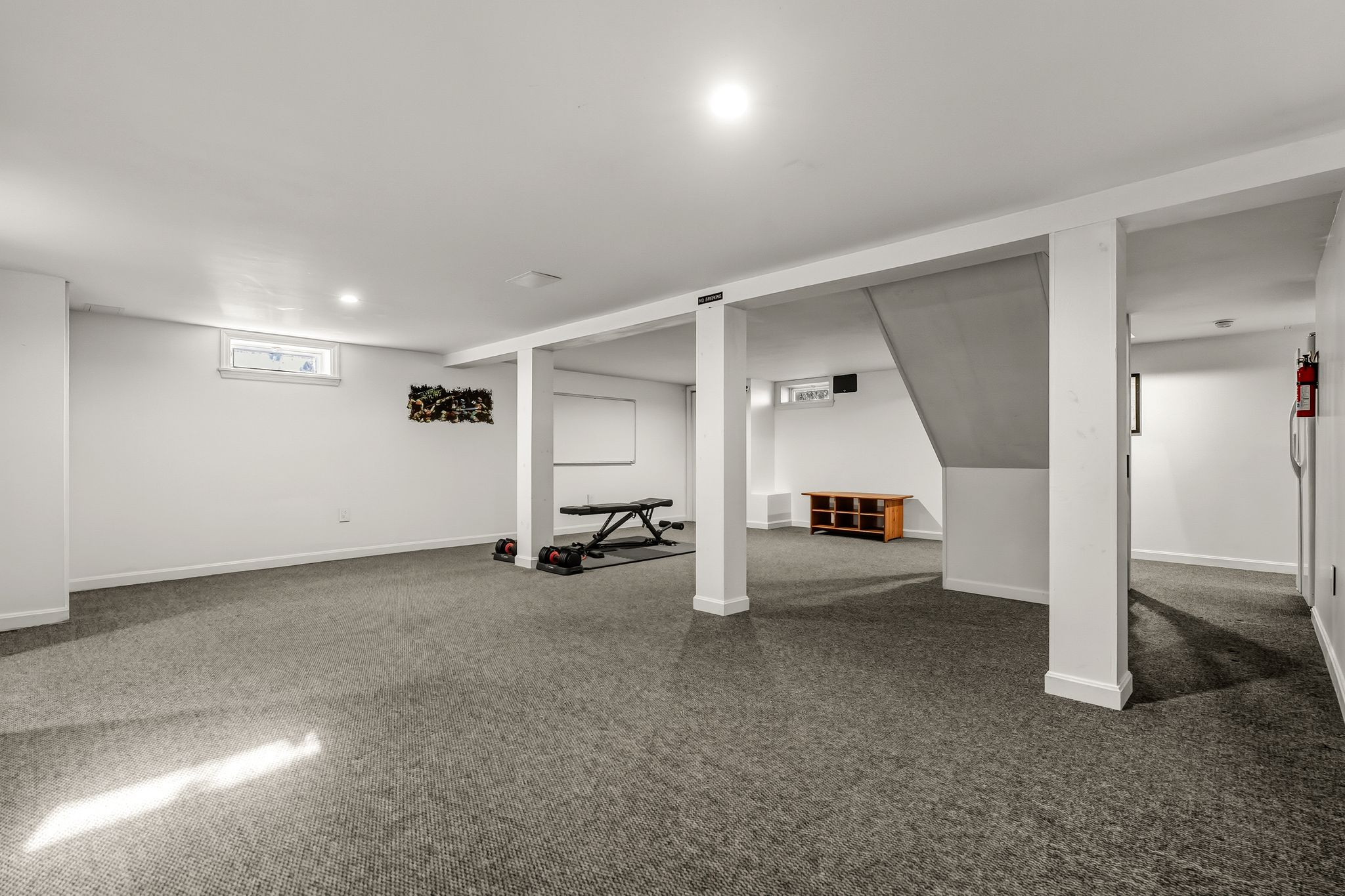 129 H J Albee Drive Braintree, MA 02184 - Photo 23 of 36 an empty room with a bathroom and mirror