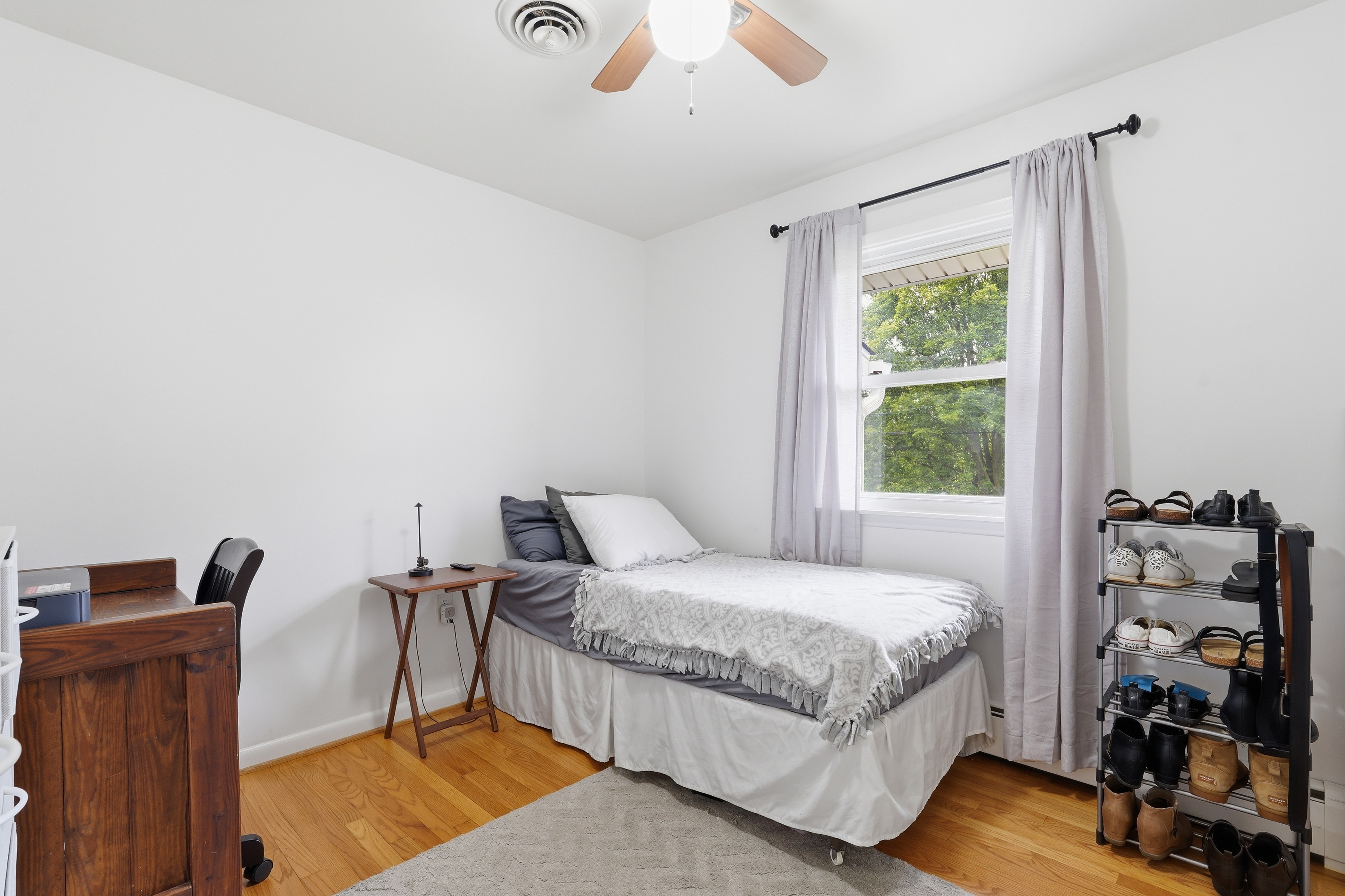 7717 McKaig Road Frederick, MD 21701 - Photo 33 of 53 a bedroom with a bed and wooden floor