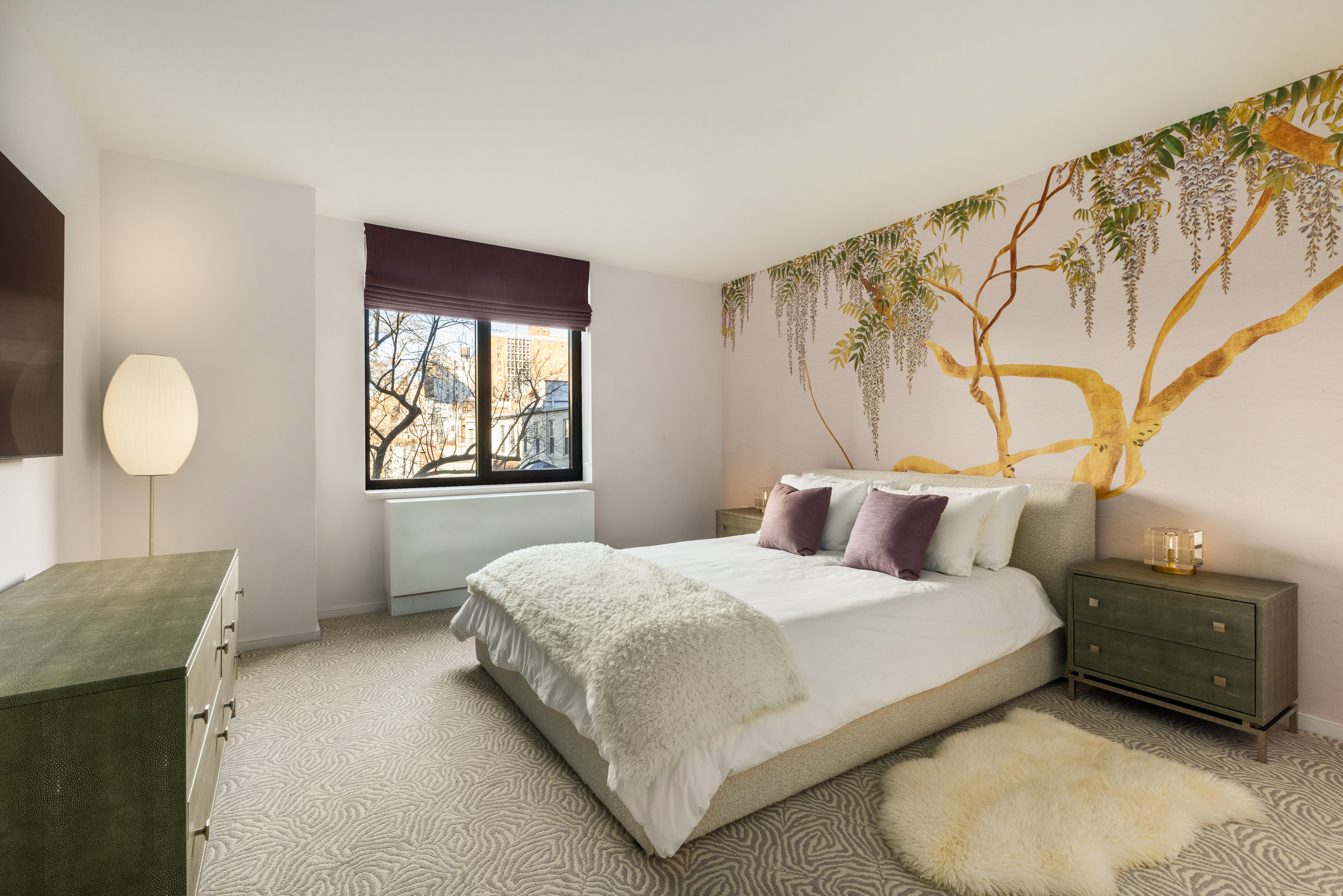 101 West 87th Street, Unit 415 Manhattan, NY 10024 - Photo 6 of 10 a bedroom with a bed and window