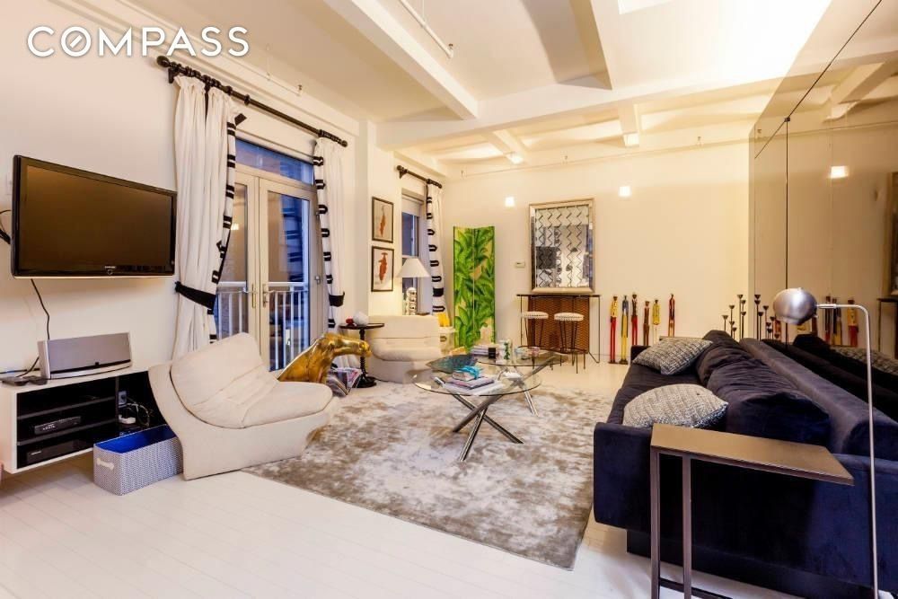 a living room with furniture a flat screen tv and floor to ceiling window