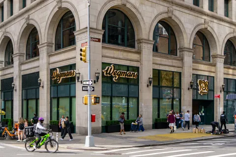 a view of a multi story building with many windows
