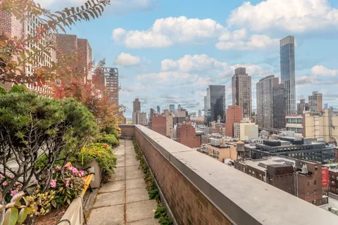 a view of a city with tall buildings
