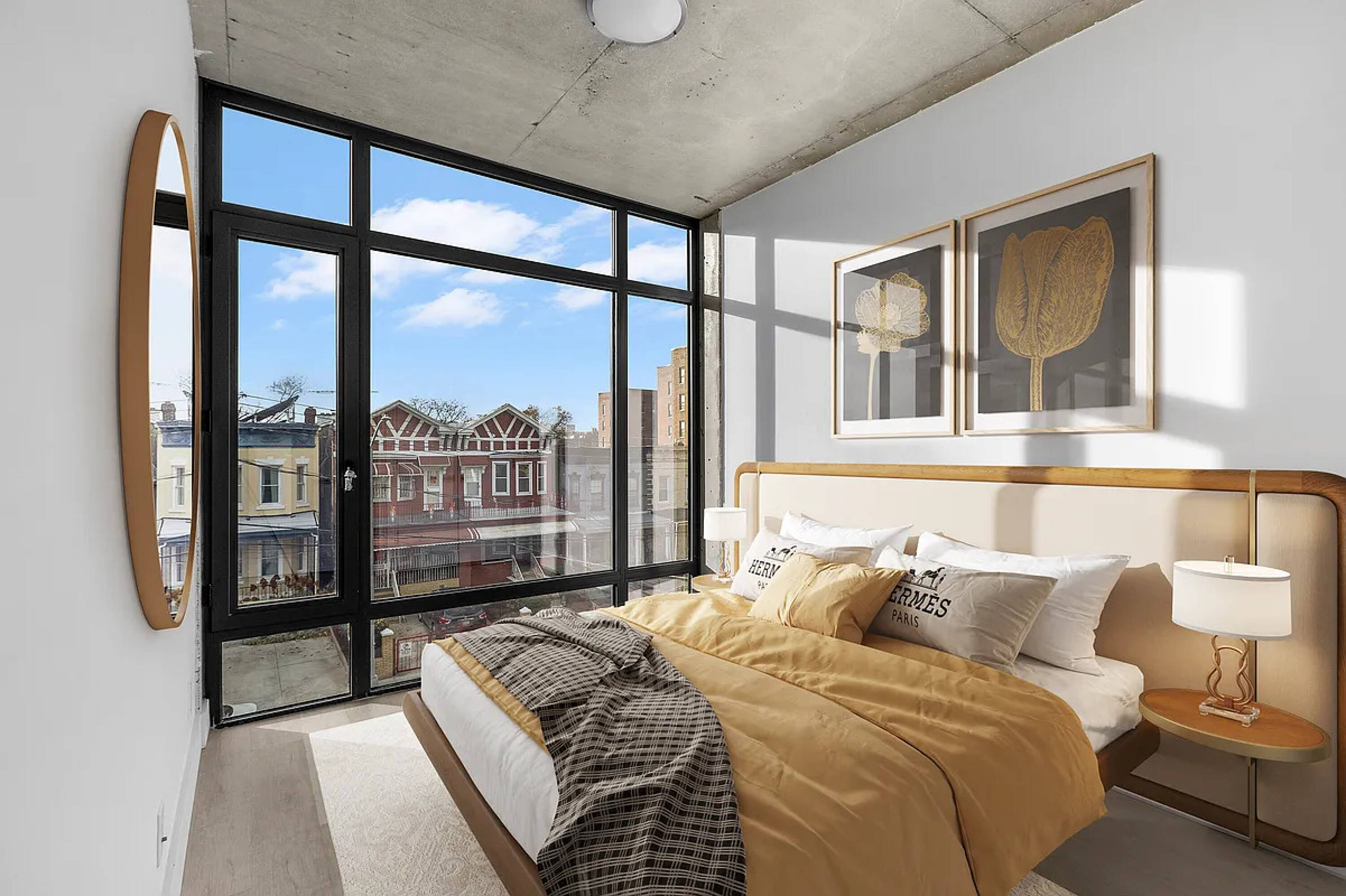 485 East 28th Street Brooklyn, NY 11226 - Photo 12 of 17 a bedroom with a large bed and a large window