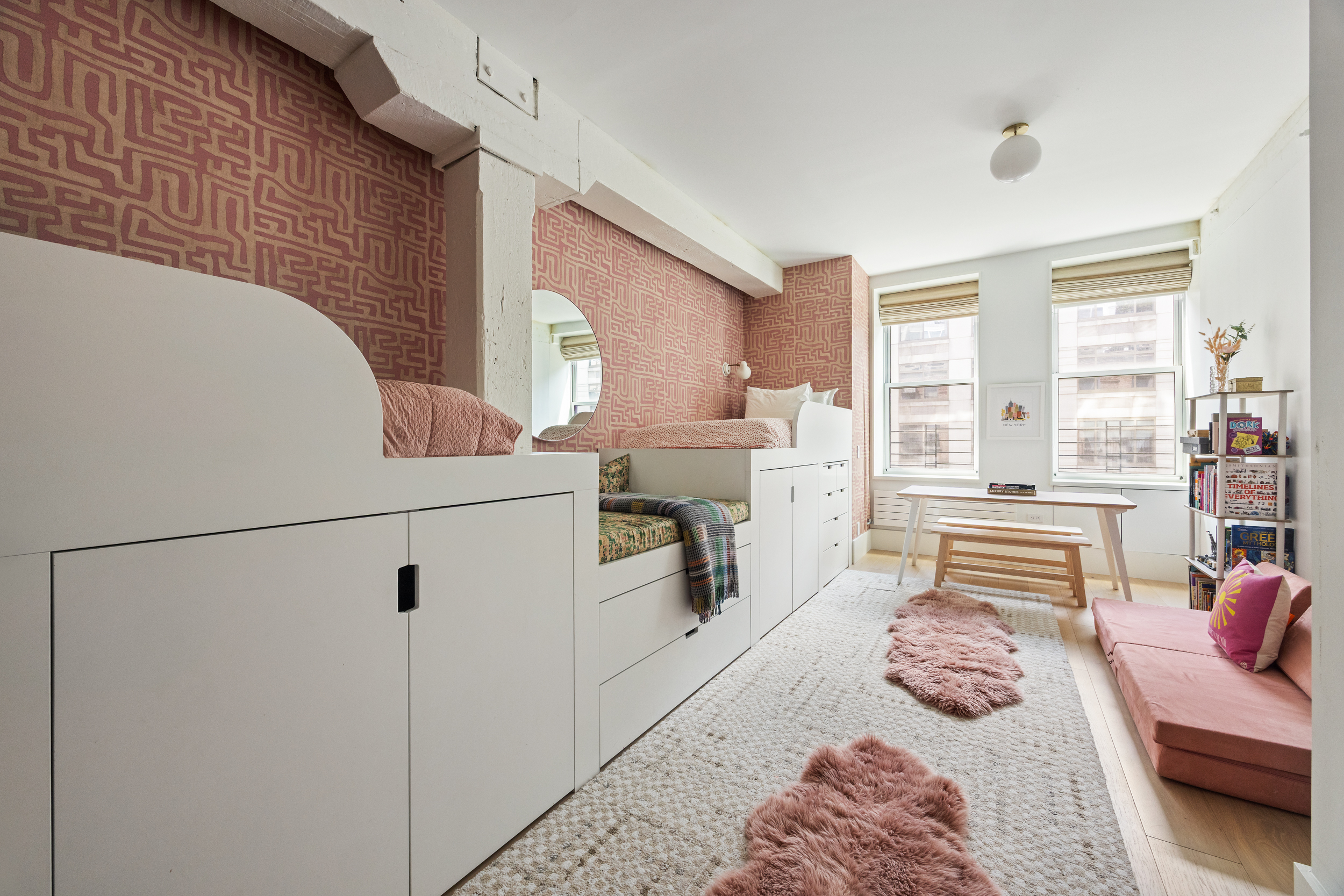 622 Greenwich Street, Unit 4B Manhattan, NY 10014 - Photo 22 of 27 a bedroom with furniture and a fireplace