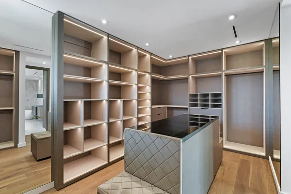 a kitchen with cabinets and window
