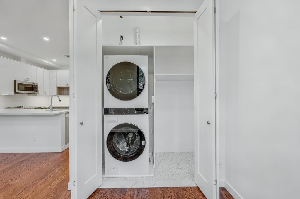 109 President Street, Unit 4 Brooklyn, NY 11231 - Photo 15 of 22 a view of a hallway with washer and dryer