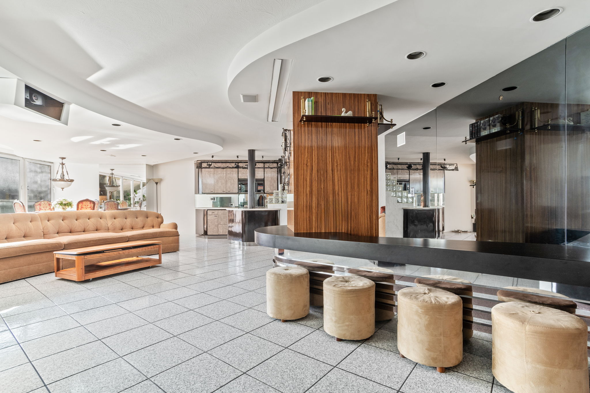 363 East 76th Street, Unit 2F Manhattan, NY 10075 - Photo 2 of 21 a dining hall with stainless steel appliances kitchen island granite countertop a sink and cabinets